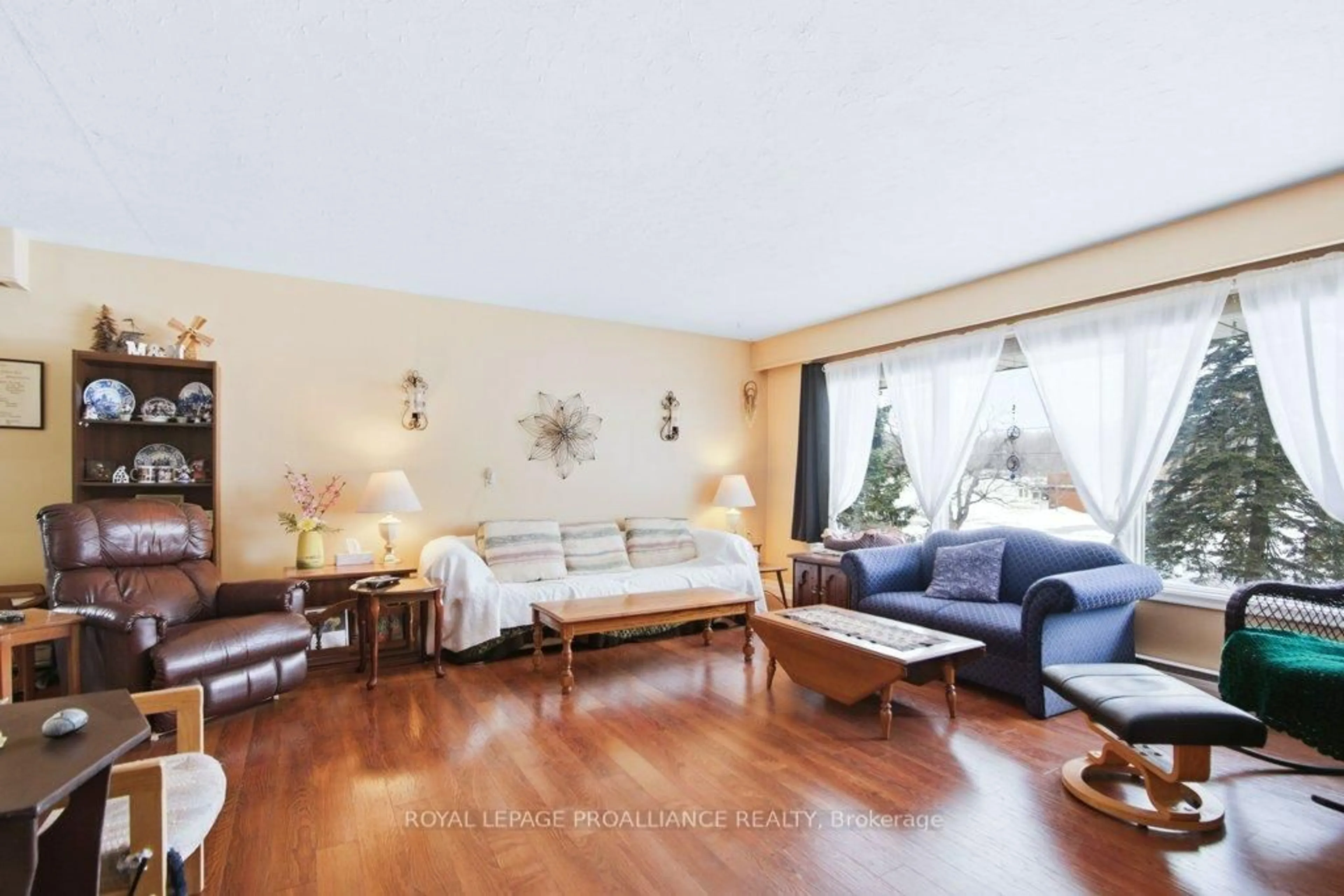 Living room with furniture, wood/laminate floor for 61 Lafferty Rd, Trenton Ontario K8V 5P7