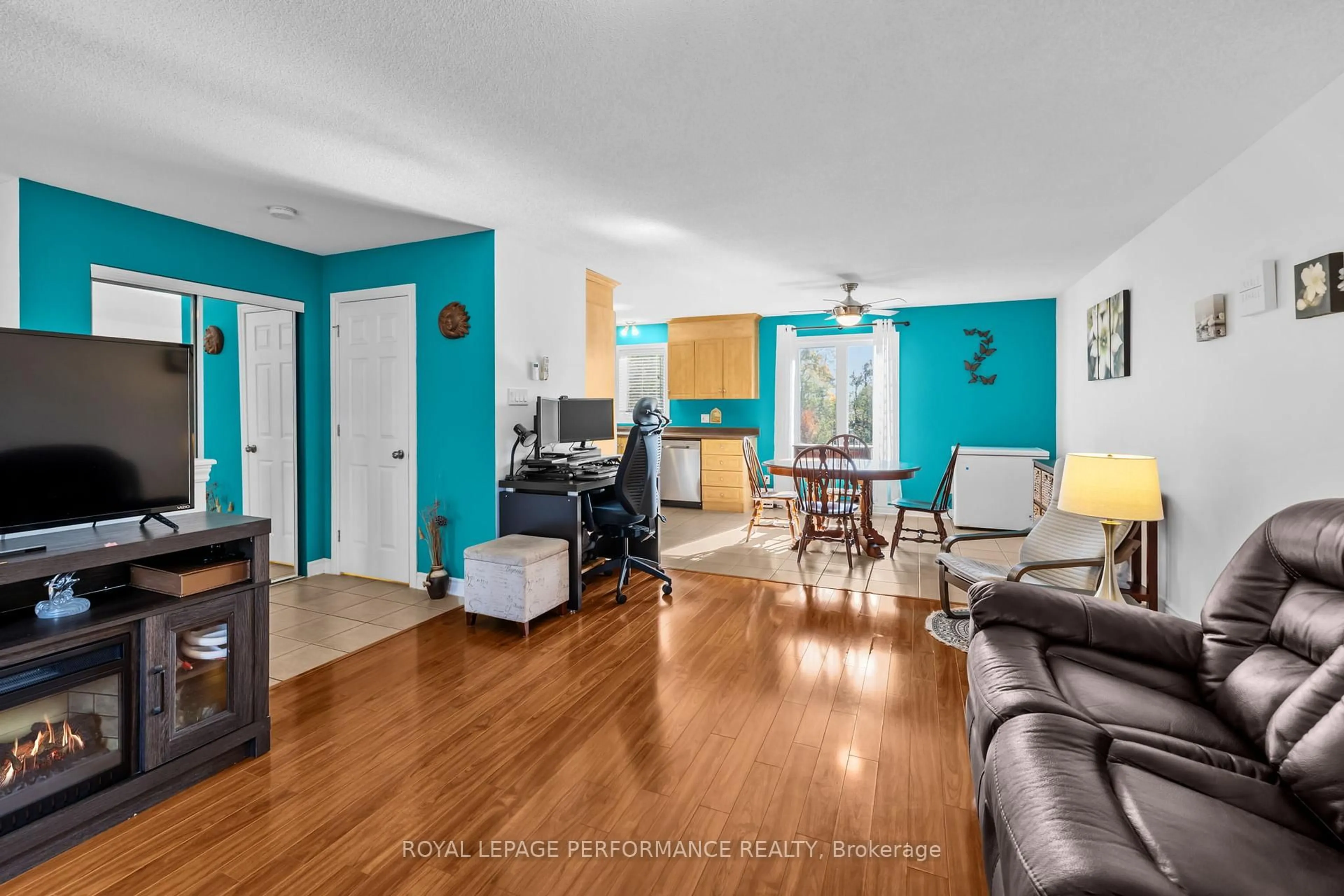 Living room with furniture, wood/laminate floor for 39 Main St #5, The Nation Ontario K0A 2M0