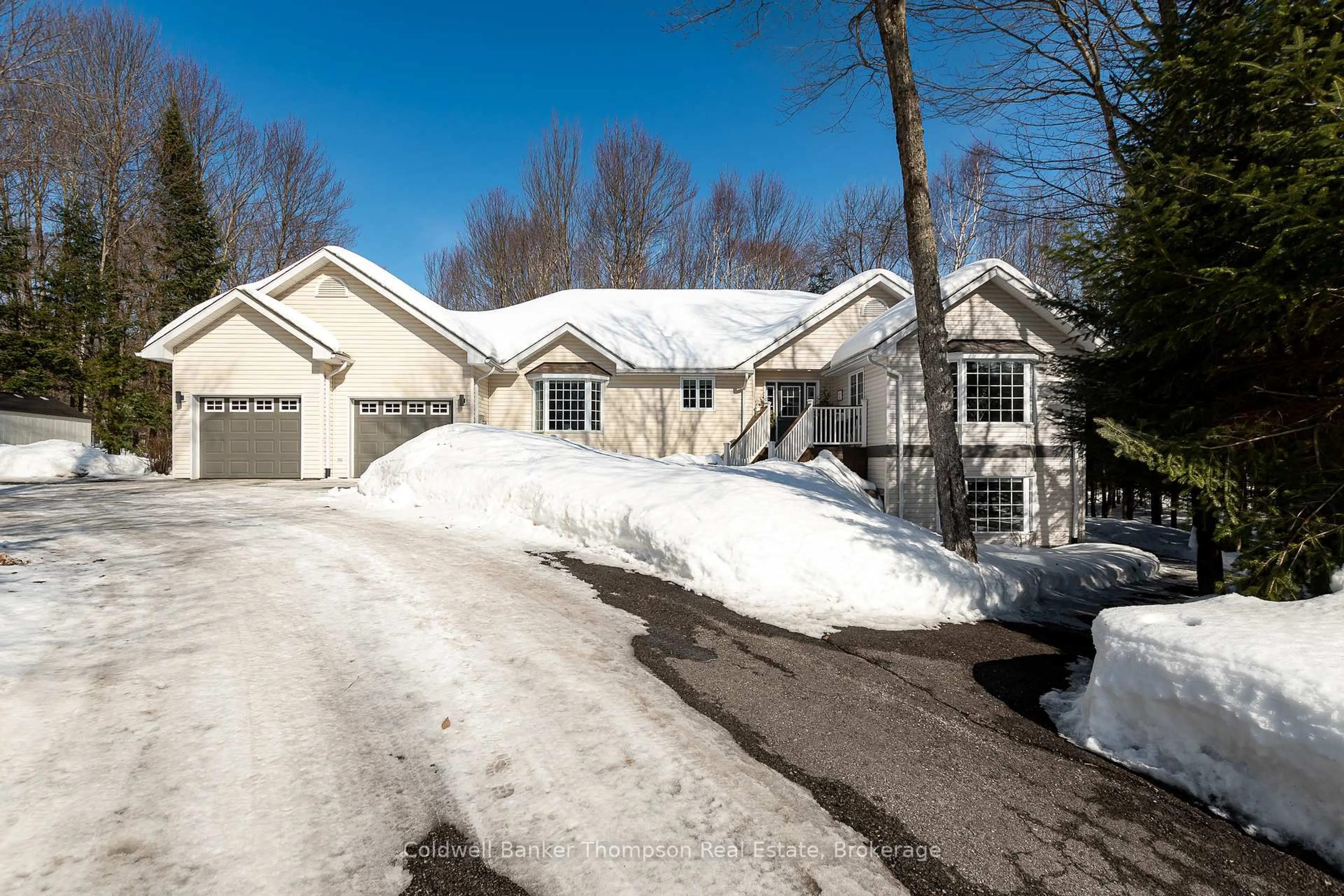 A pic from outside/outdoor area/front of a property/back of a property/a pic from drone, street for 24 Birchwood Cres, Huntsville Ontario P1H 0A6