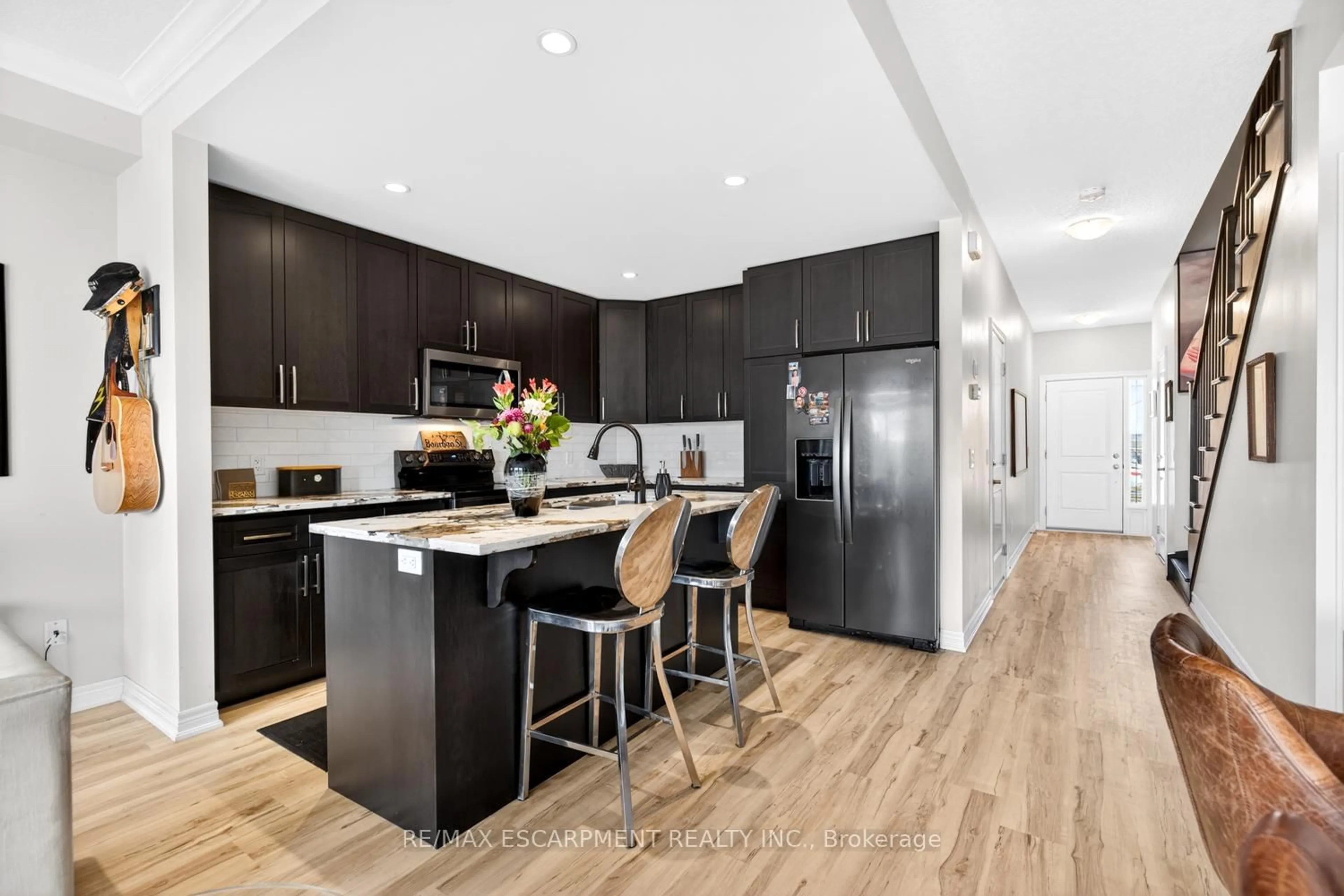 Open concept kitchen, wood/laminate floor for 27 Rachel Dr #12, Hamilton Ontario L8E 0K6