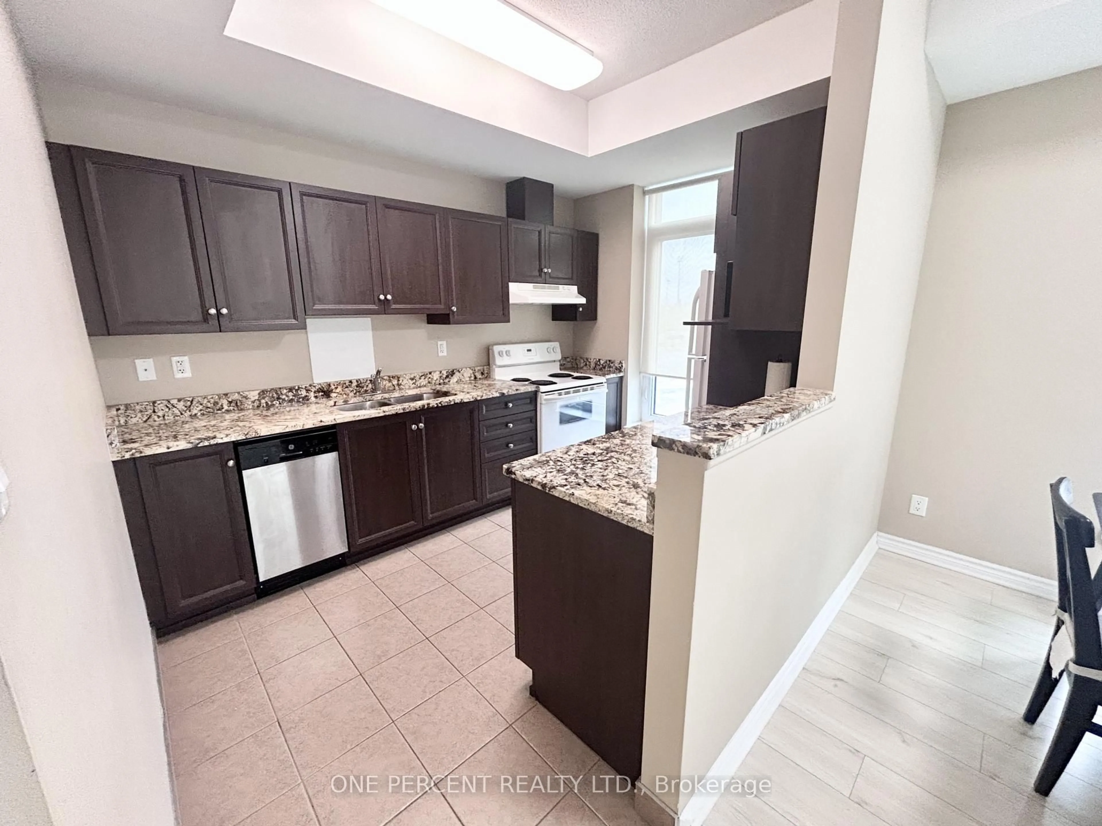 Standard kitchen, ceramic/tile floor for 100 ROGER GUINDON Ave #201, Ottawa Ontario K1G 3Z7