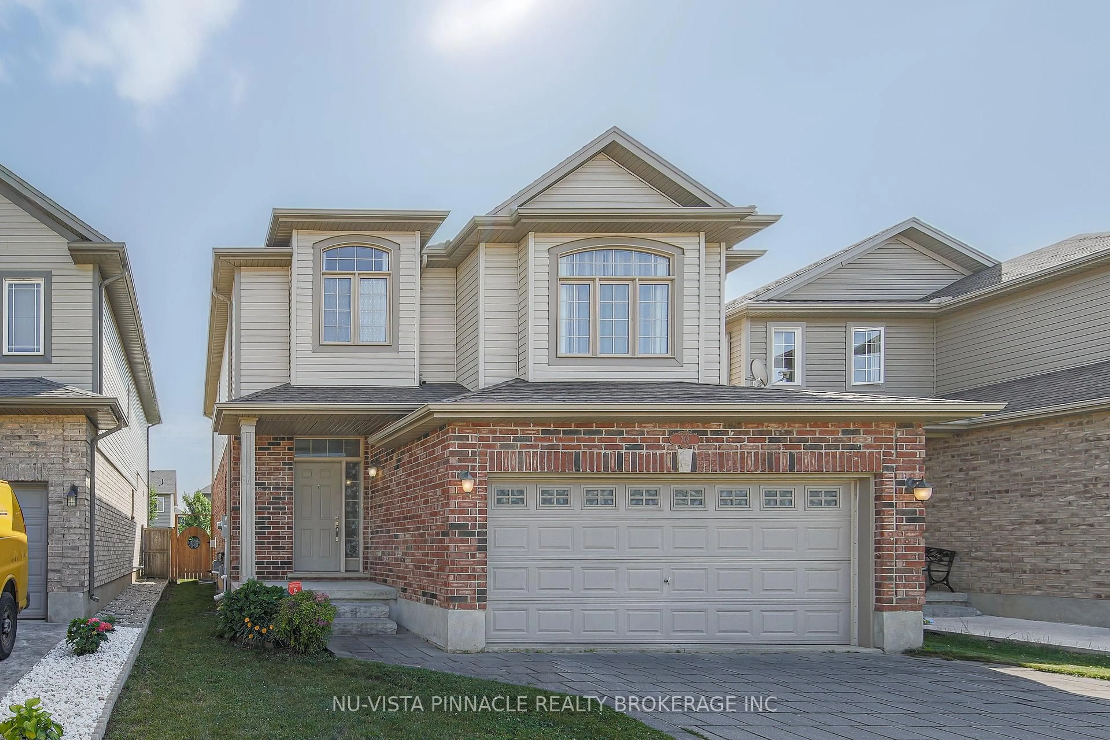 Home with brick exterior material, street for 702 Springwood Cres, London North Ontario N6G 0H8