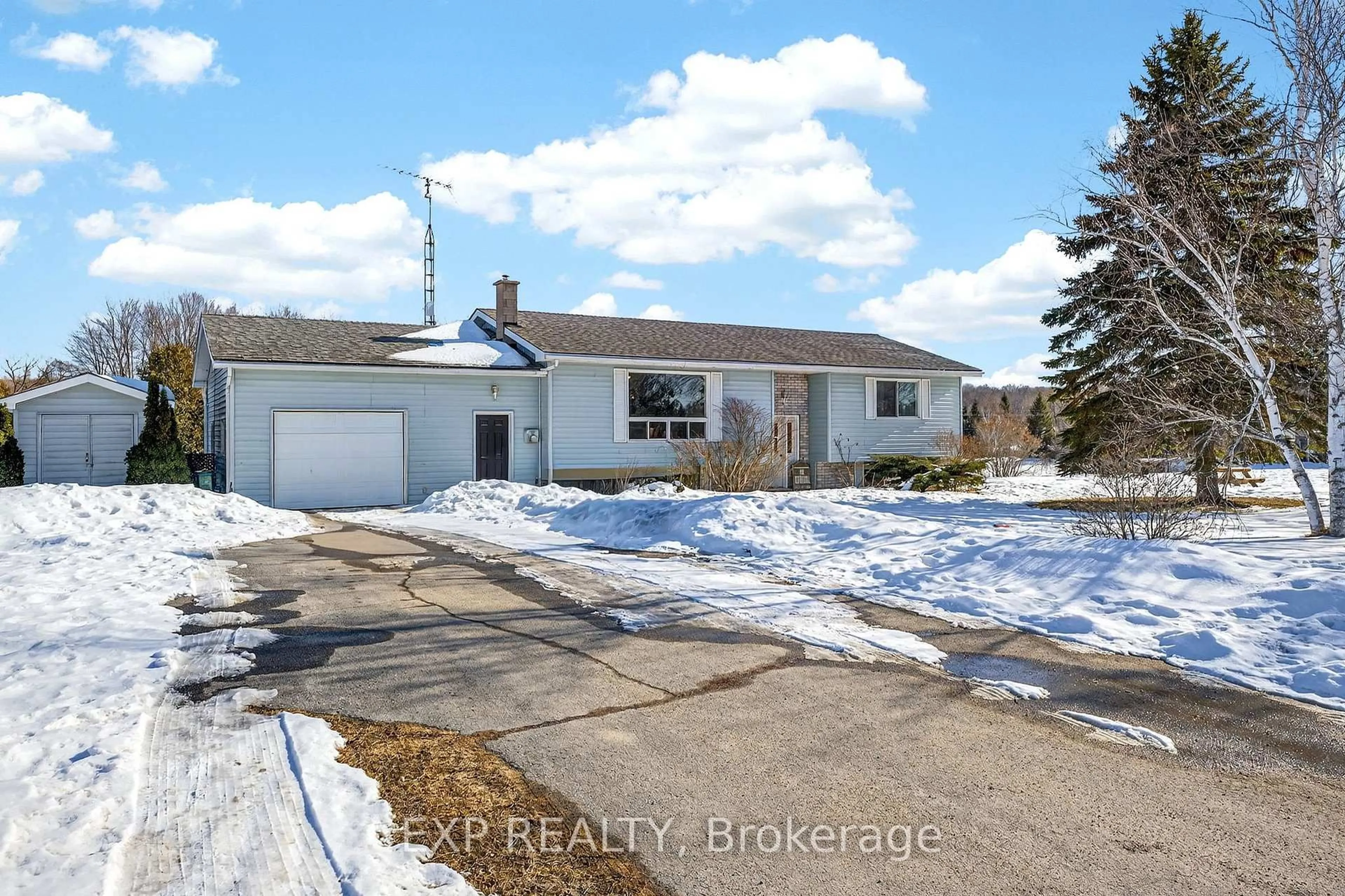 A pic from outside/outdoor area/front of a property/back of a property/a pic from drone, street for 1423 Ridge Rd, Prince Edward County Ontario K0K 2T0