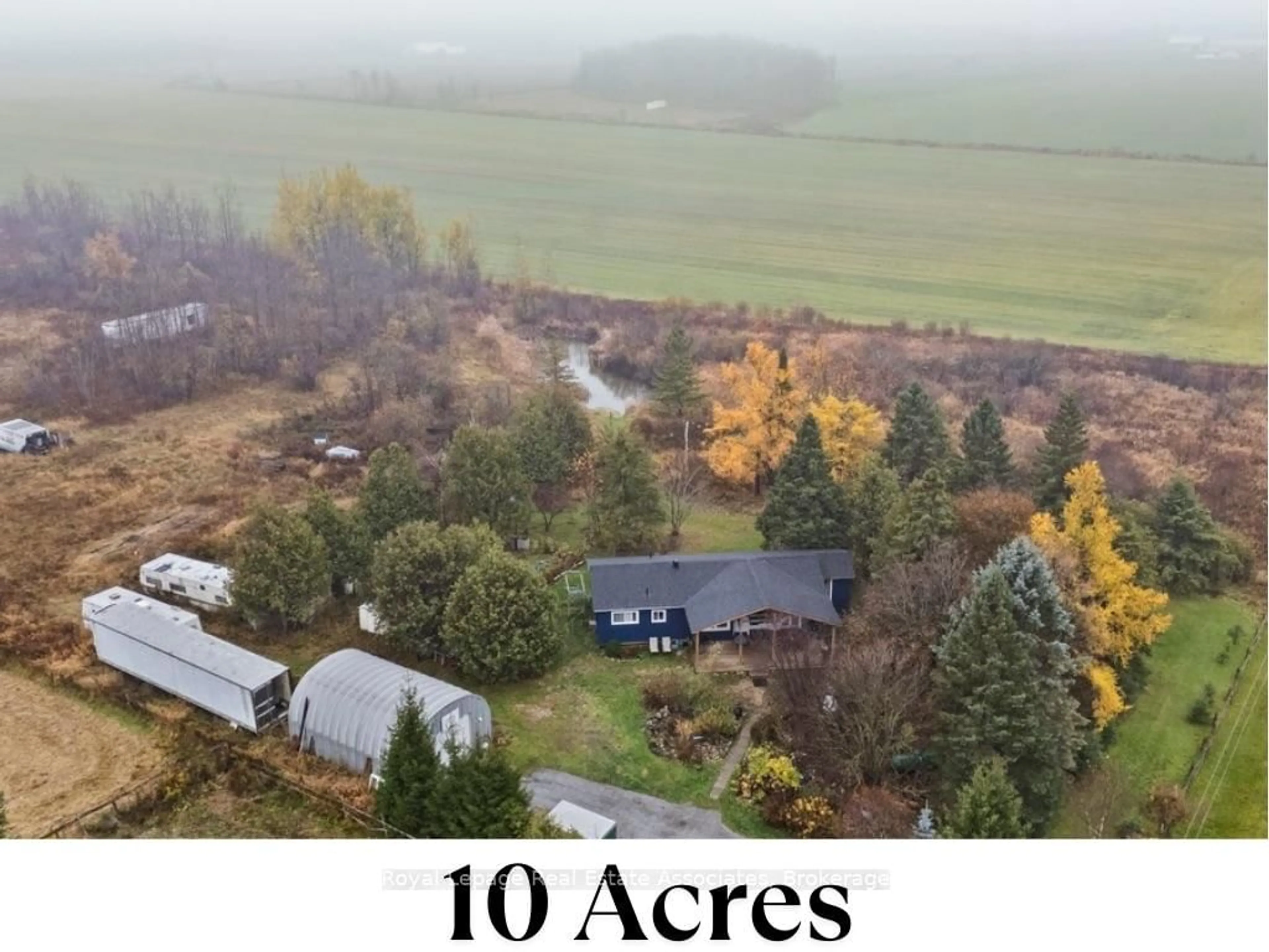 A pic from outside/outdoor area/front of a property/back of a property/a pic from drone, street for 180118 Grey Road 9 Rd, Southgate Ontario N0C 1B0