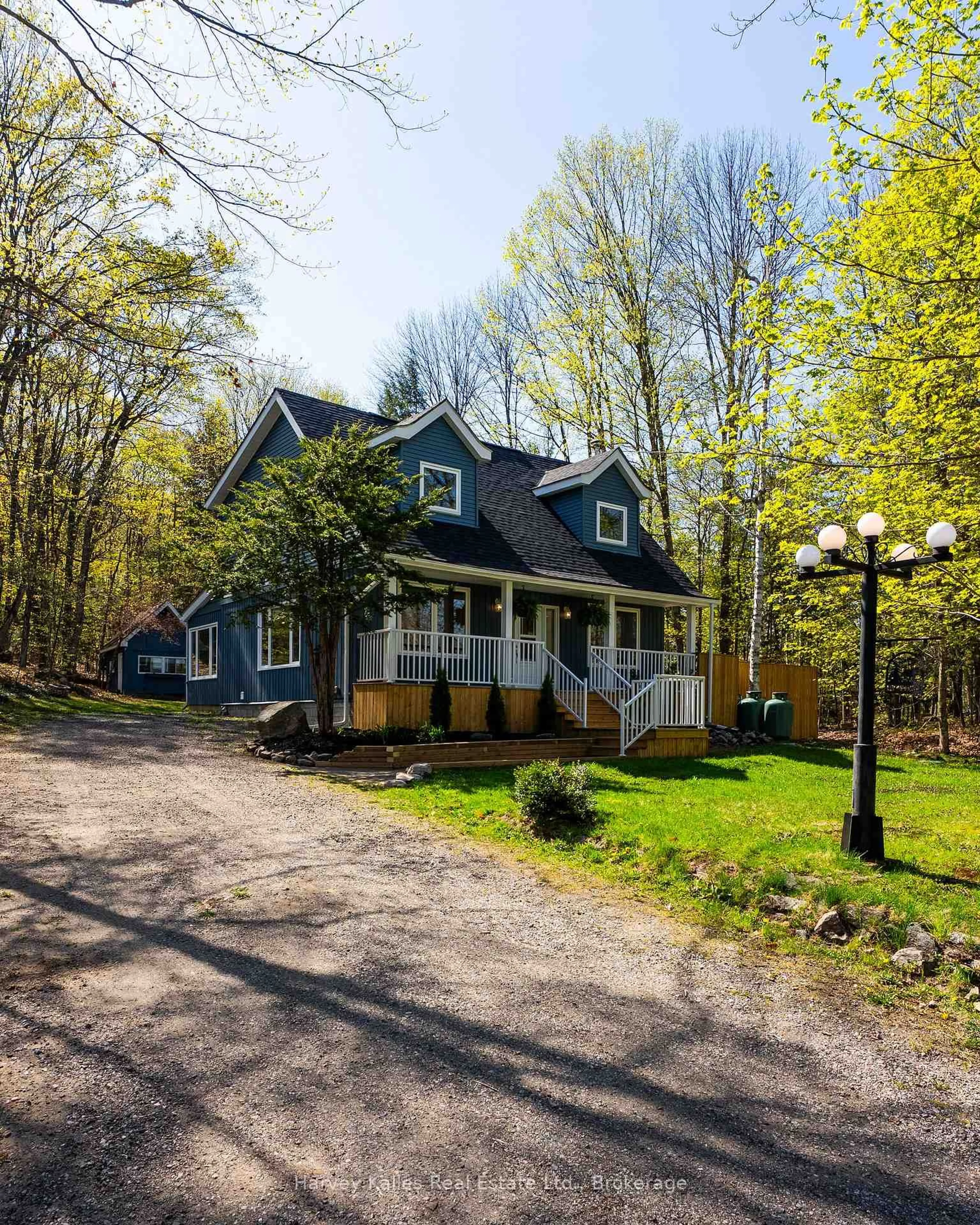 A pic from outside/outdoor area/front of a property/back of a property/a pic from drone, street for 21 Todholm Dr, Muskoka Lakes Ontario P0B 1J0