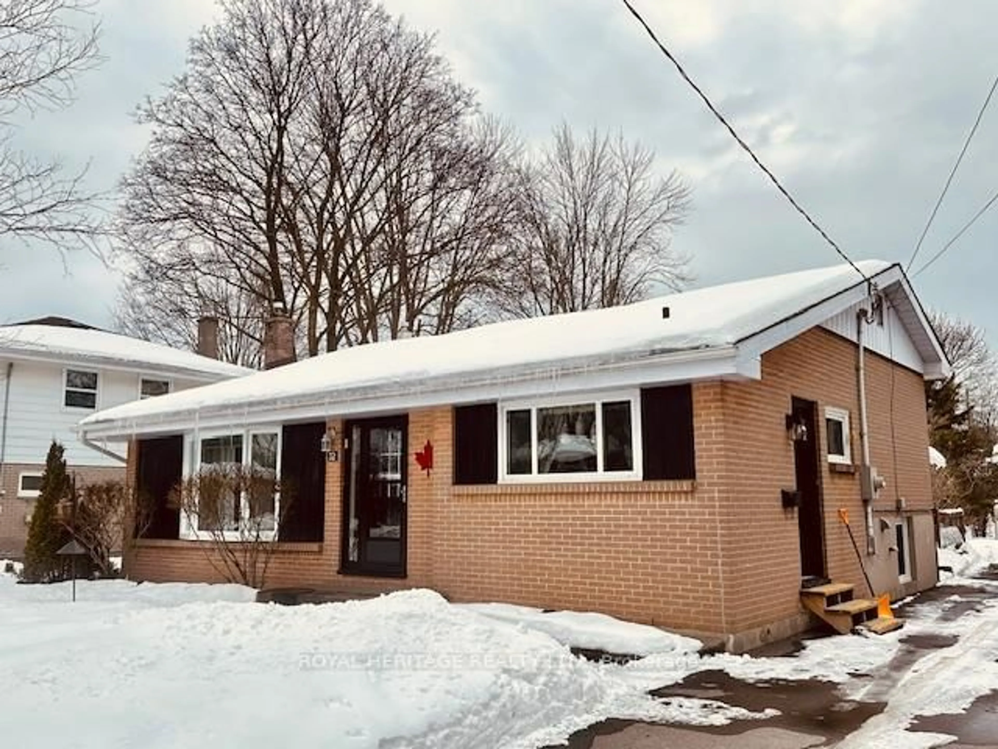 Home with brick exterior material, street for 32 Glen Rd, Belleville Ontario K8P 4G1