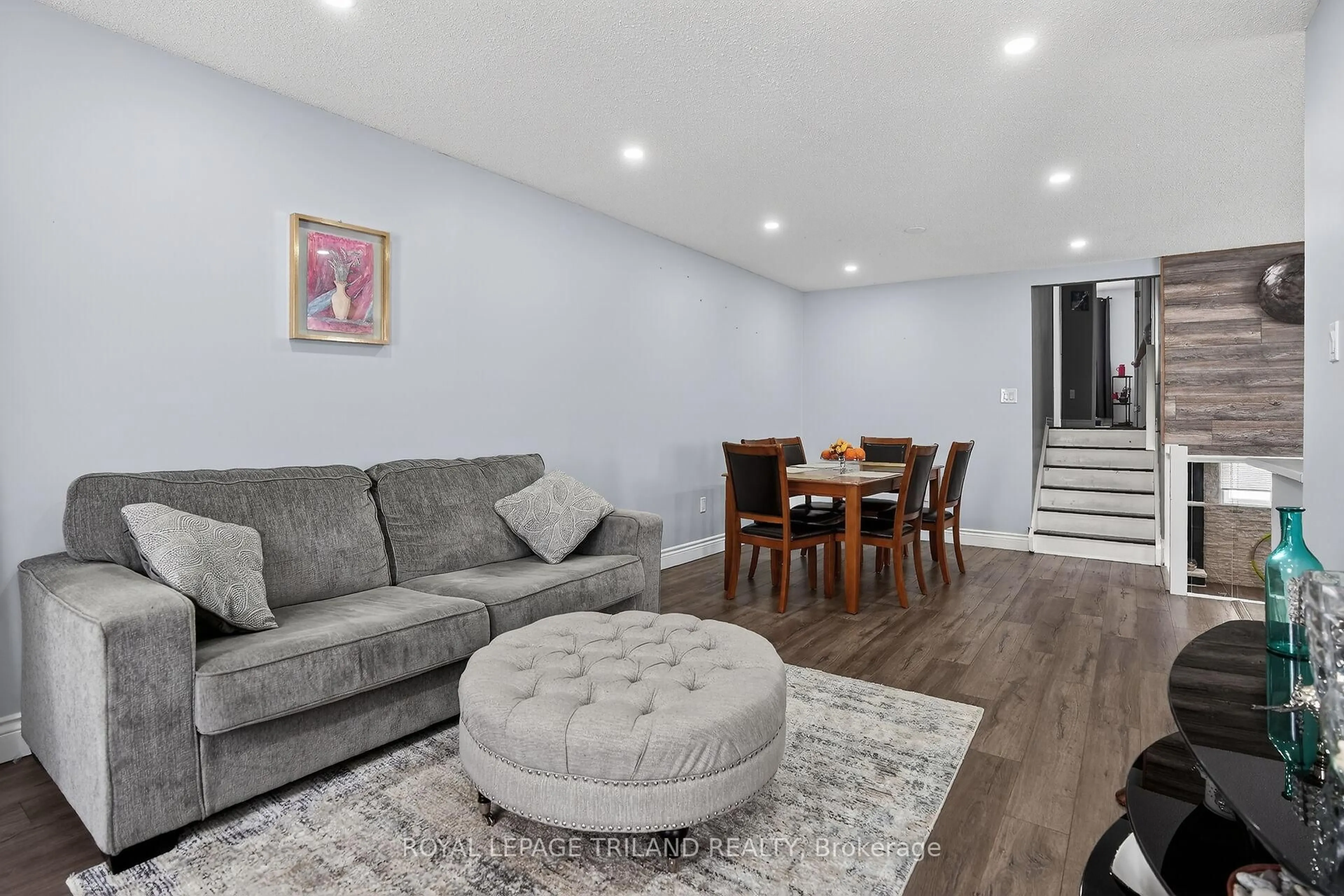 Living room with furniture, wood/laminate floor for 328 CONWAY Dr, London South Ontario N6E 3J9