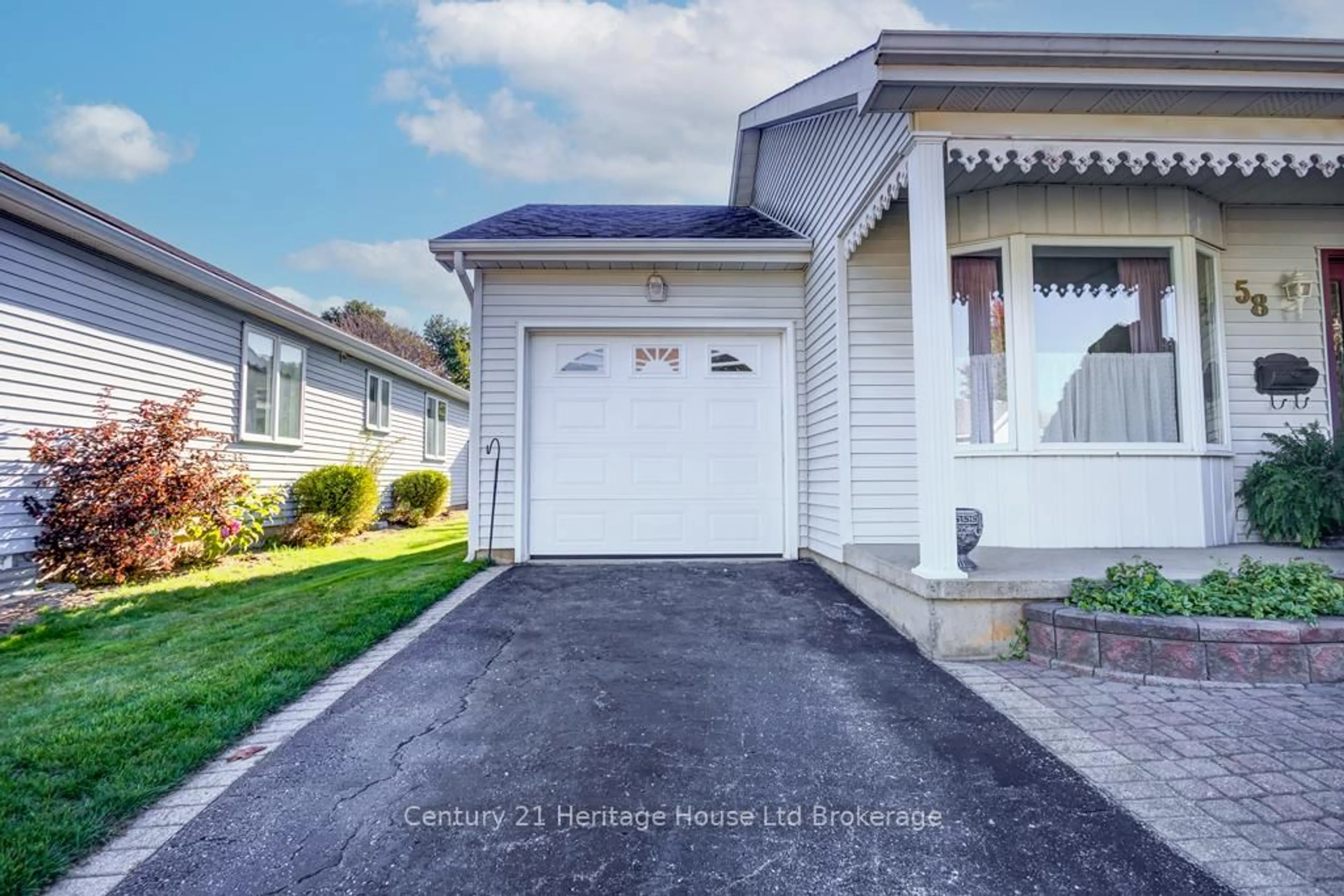 Home with vinyl exterior material, street for 58 Wilkins Cres, Tillsonburg Ontario N4G 5M5