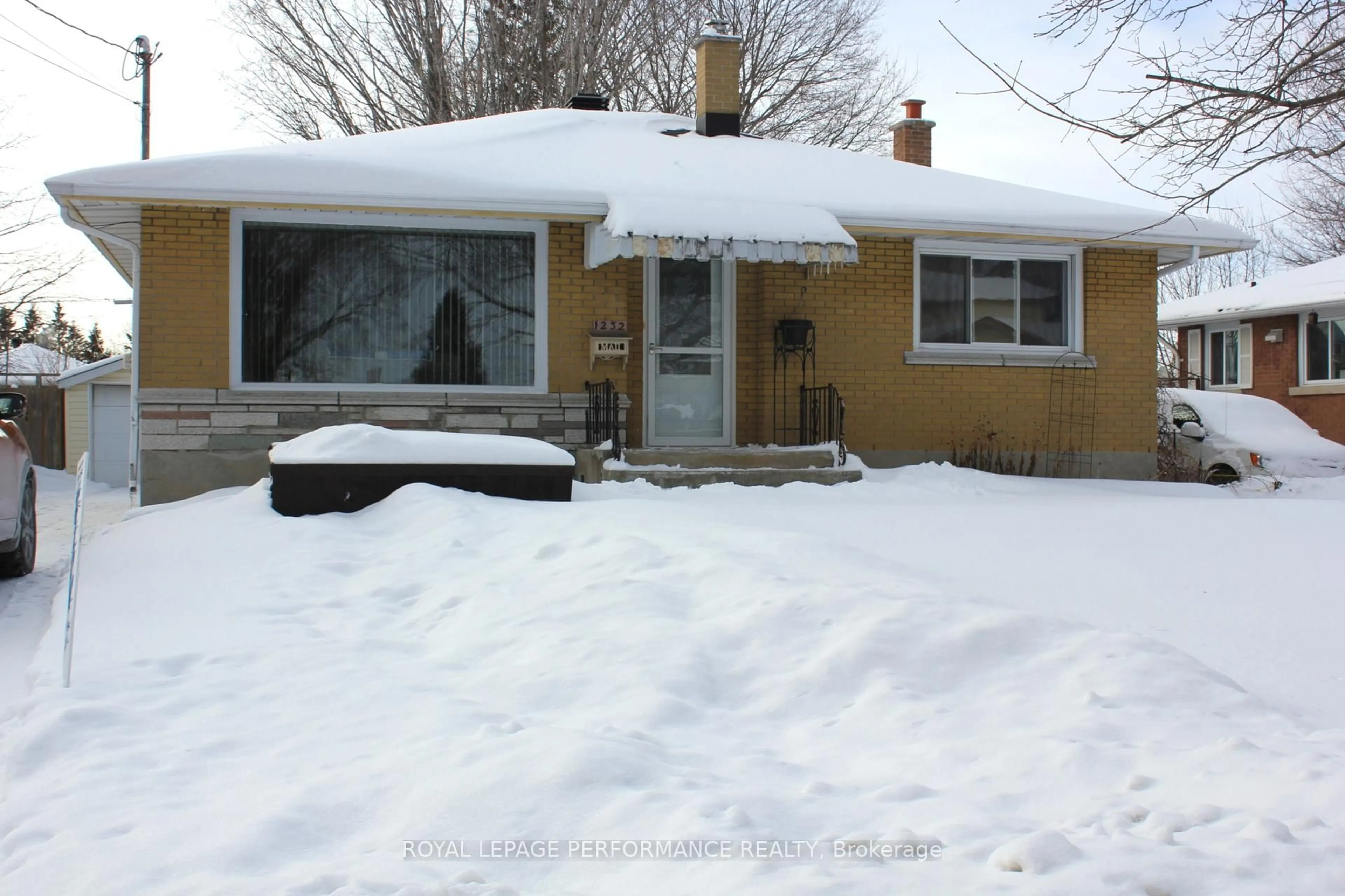 Home with vinyl exterior material, street for 1232 Daly Ave, Cornwall Ontario K6J 4W2