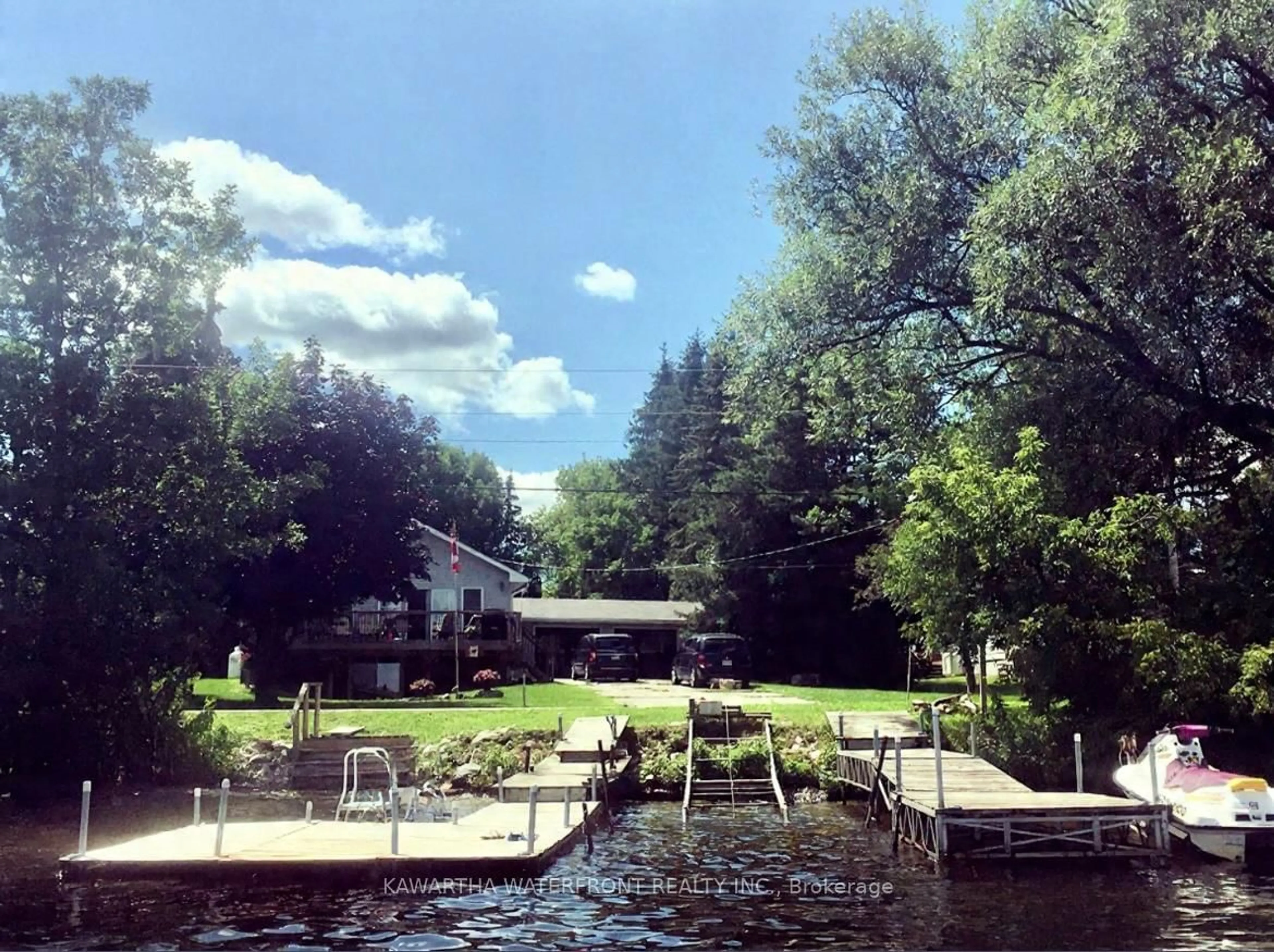A pic from outside/outdoor area/front of a property/back of a property/a pic from drone, water/lake/river/ocean view for 519 Long Beach Rd, Kawartha Lakes Ontario K0M 1G0