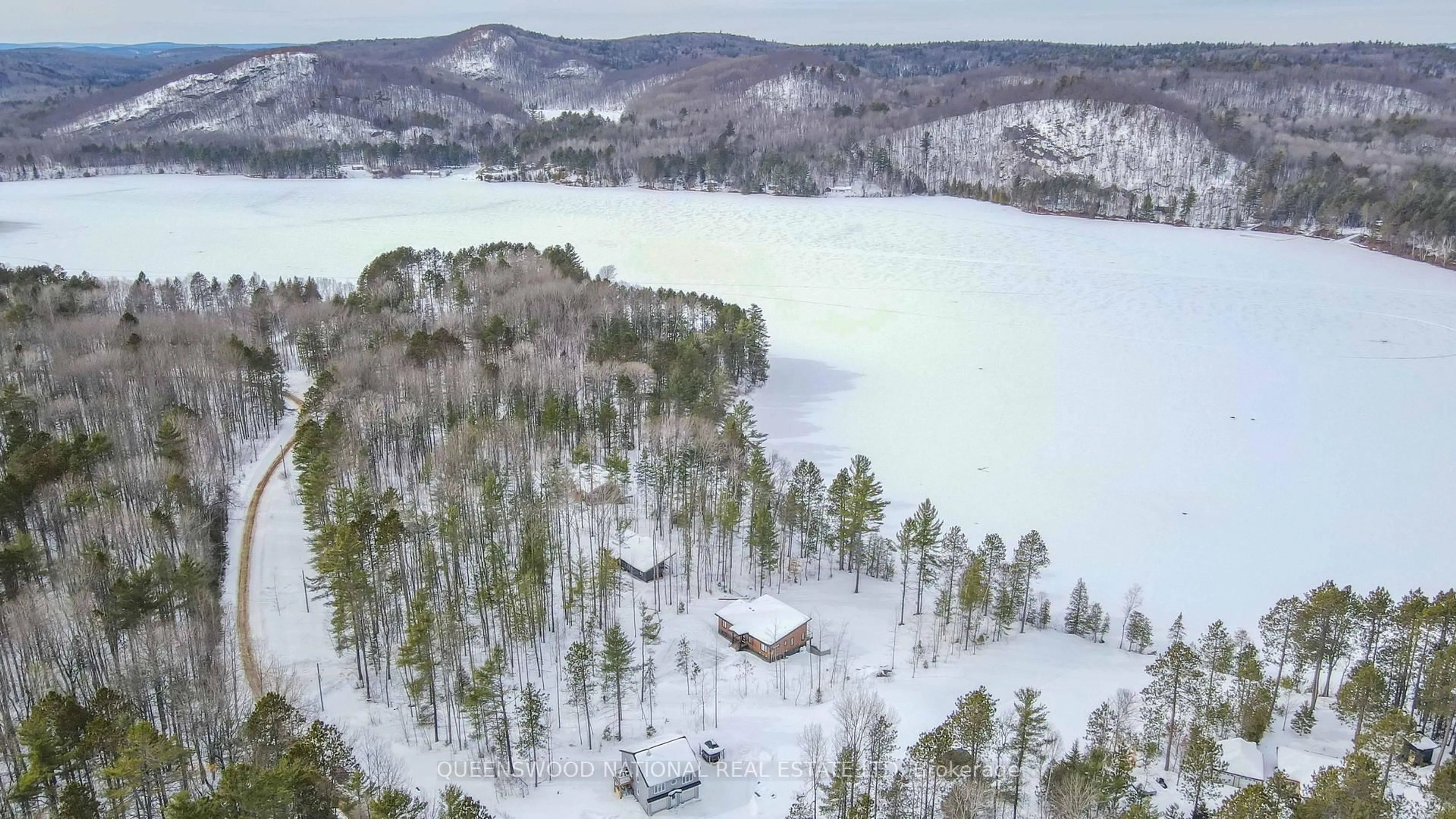 A pic from outside/outdoor area/front of a property/back of a property/a pic from drone, water/lake/river/ocean view for 227 Grunwald Rd, Combermere Ontario K0J 1L0