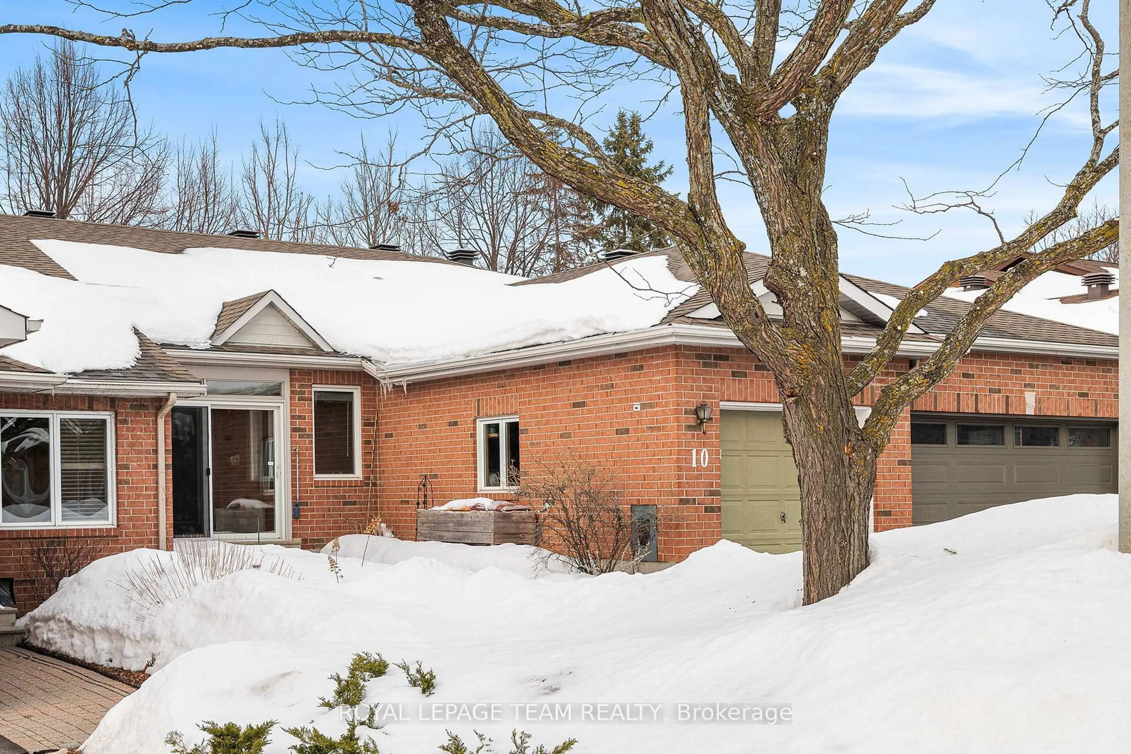 Home with brick exterior material, street for 10 Quinterra Crt, Ottawa Ontario K1V 0W6