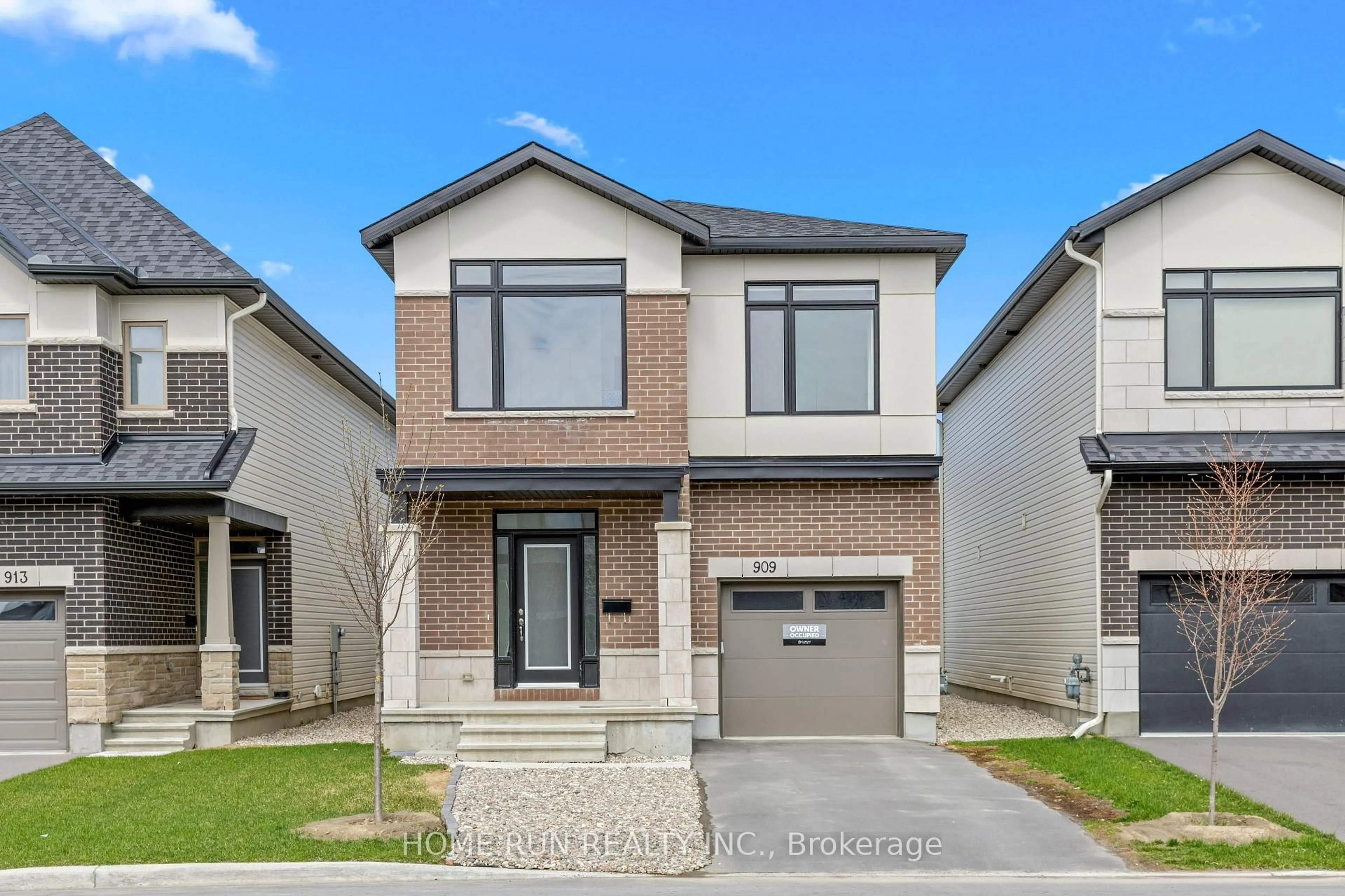 Home with brick exterior material, street for 909 Beckton Hts, Ottawa Ontario K2S 2X5