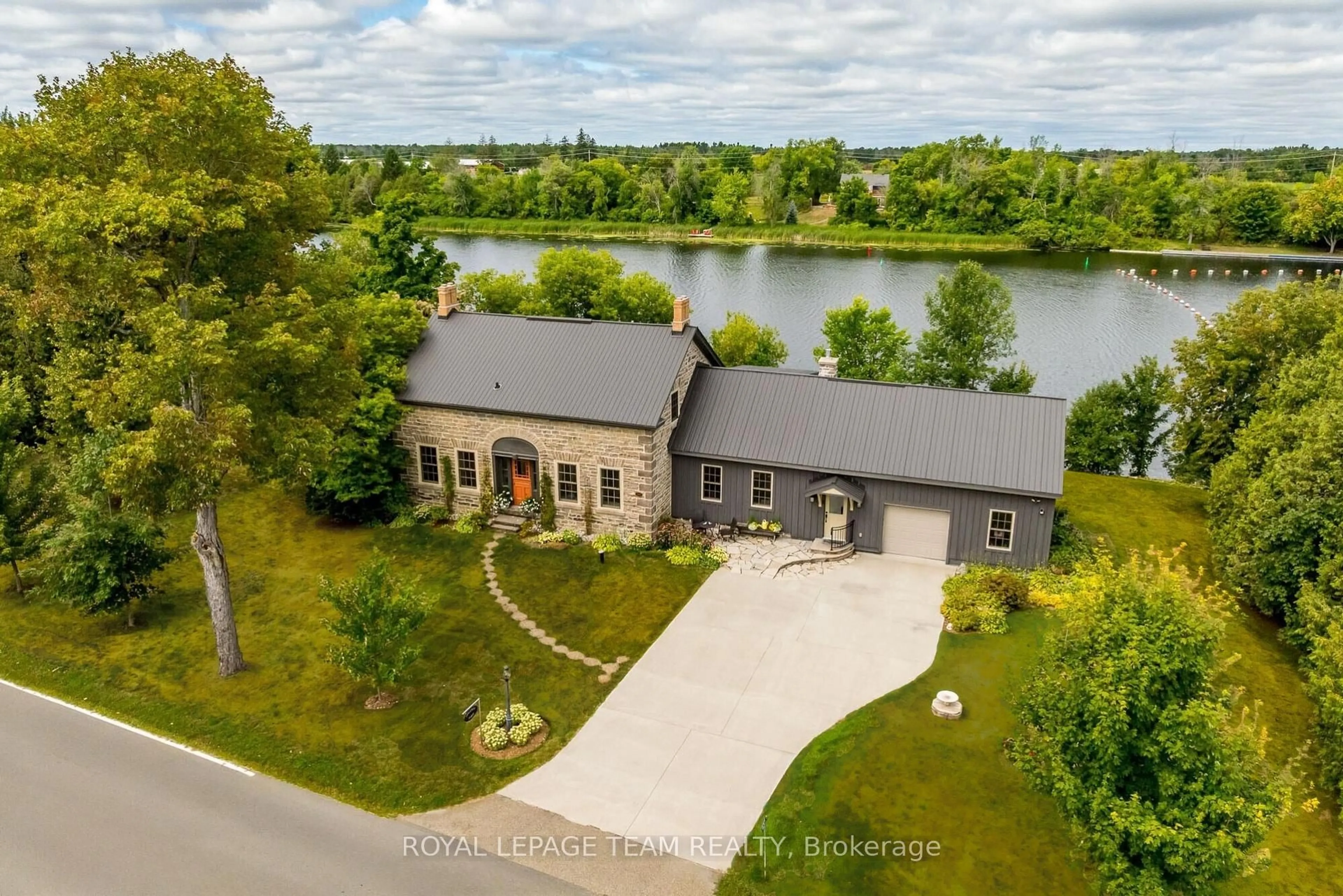 A pic from outside/outdoor area/front of a property/back of a property/a pic from drone, water/lake/river/ocean view for 437 County  23 Rd, Merrickville-Wolford Ontario K0G 1N0