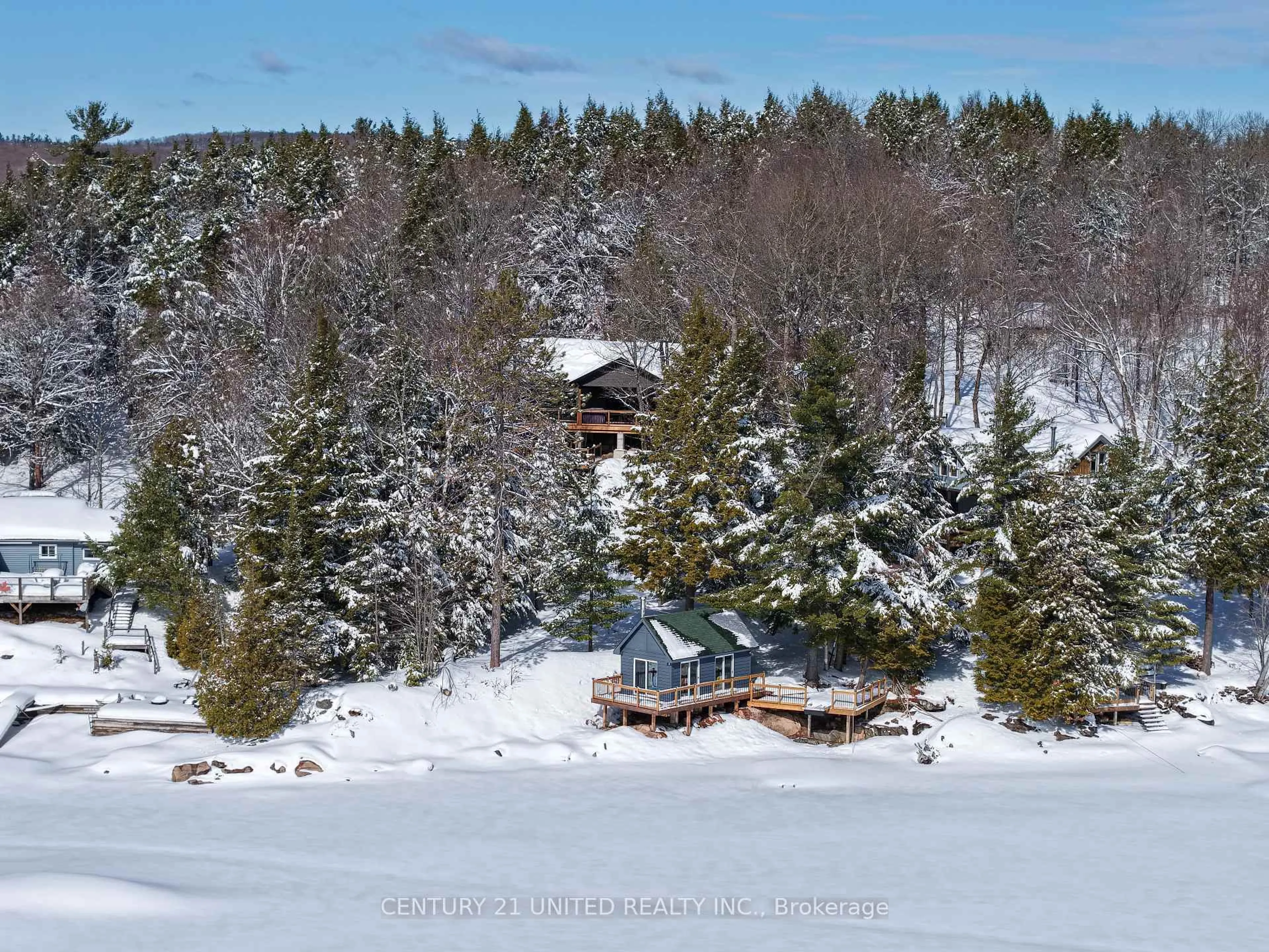 A pic from outside/outdoor area/front of a property/back of a property/a pic from drone, water/lake/river/ocean view for 1047 Hinterland Tr, Highlands East Ontario K0L 1C0