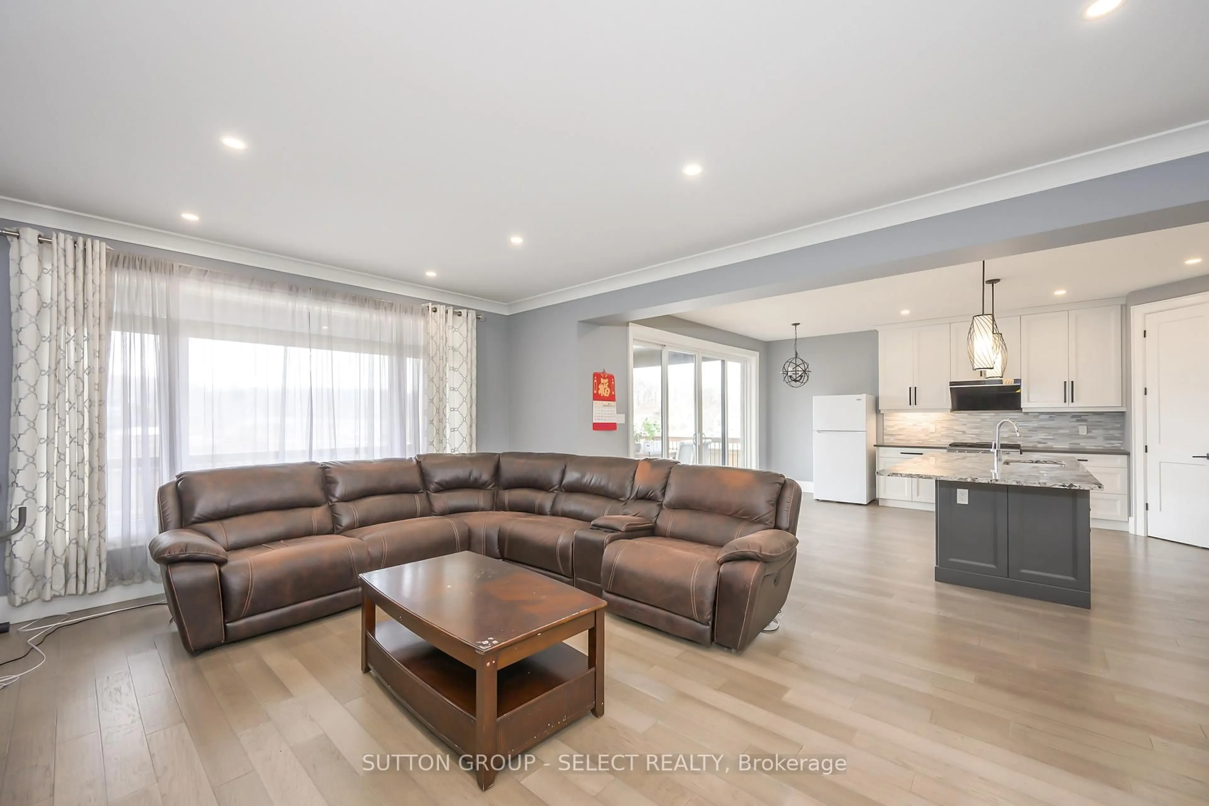 Living room with furniture, wood/laminate floor for 1796 BRAYFORD Ave, London South Ontario N6K 0H4