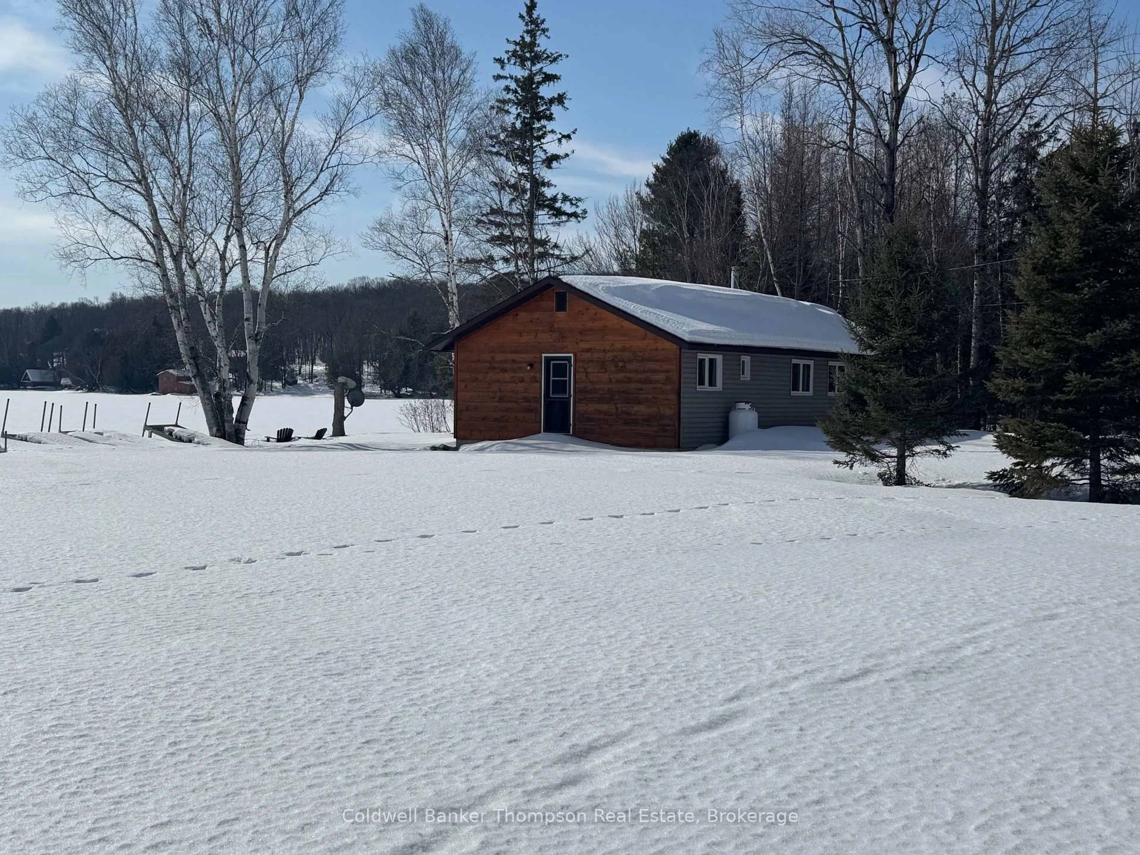 A pic from outside/outdoor area/front of a property/back of a property/a pic from drone, unknown for 3105 Highway 520 Highway, Magnetawan Ontario P0A 1P0