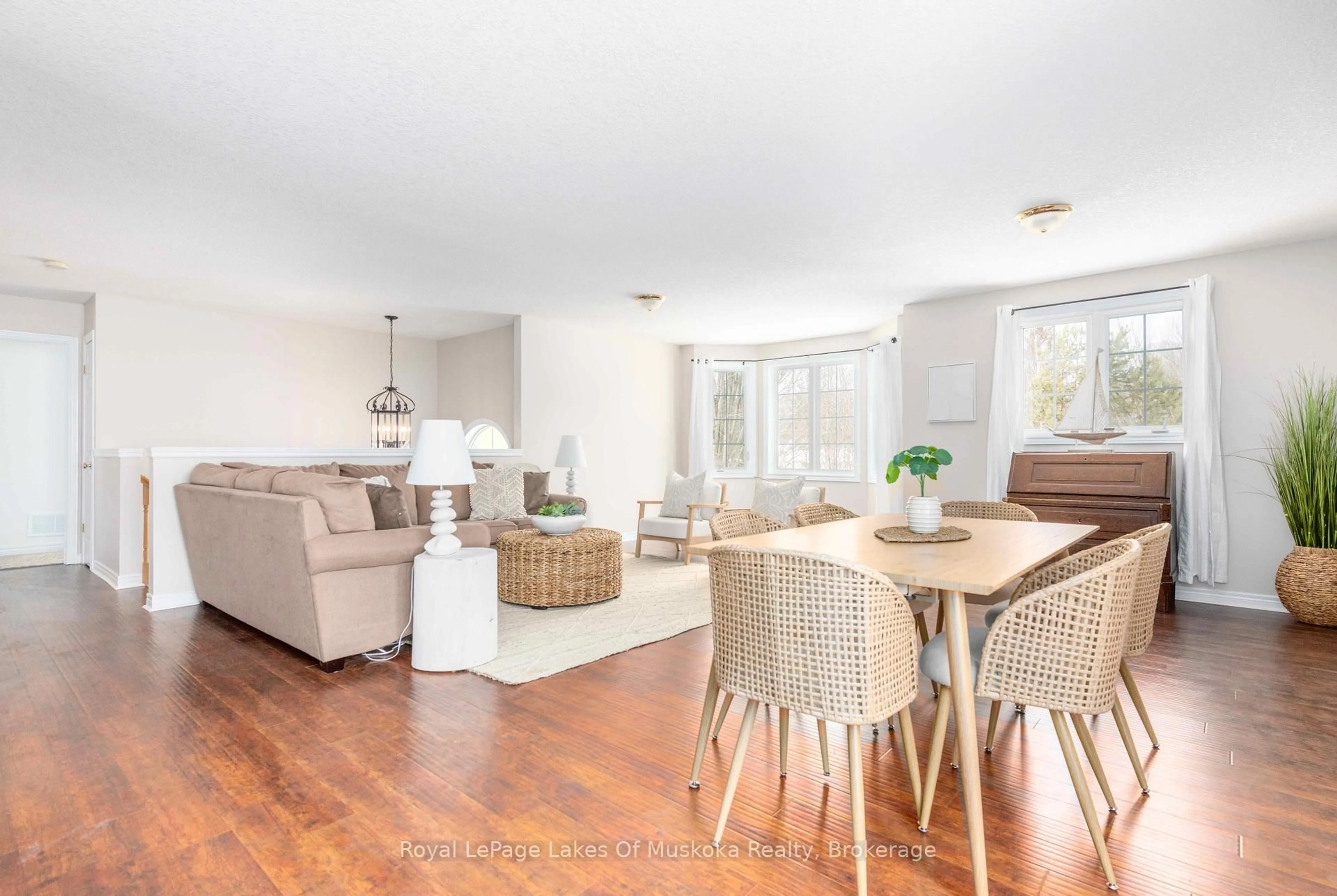 Living room with furniture, wood/laminate floor for 25 Kendra Cres, Huntsville Ontario P1H 2M5