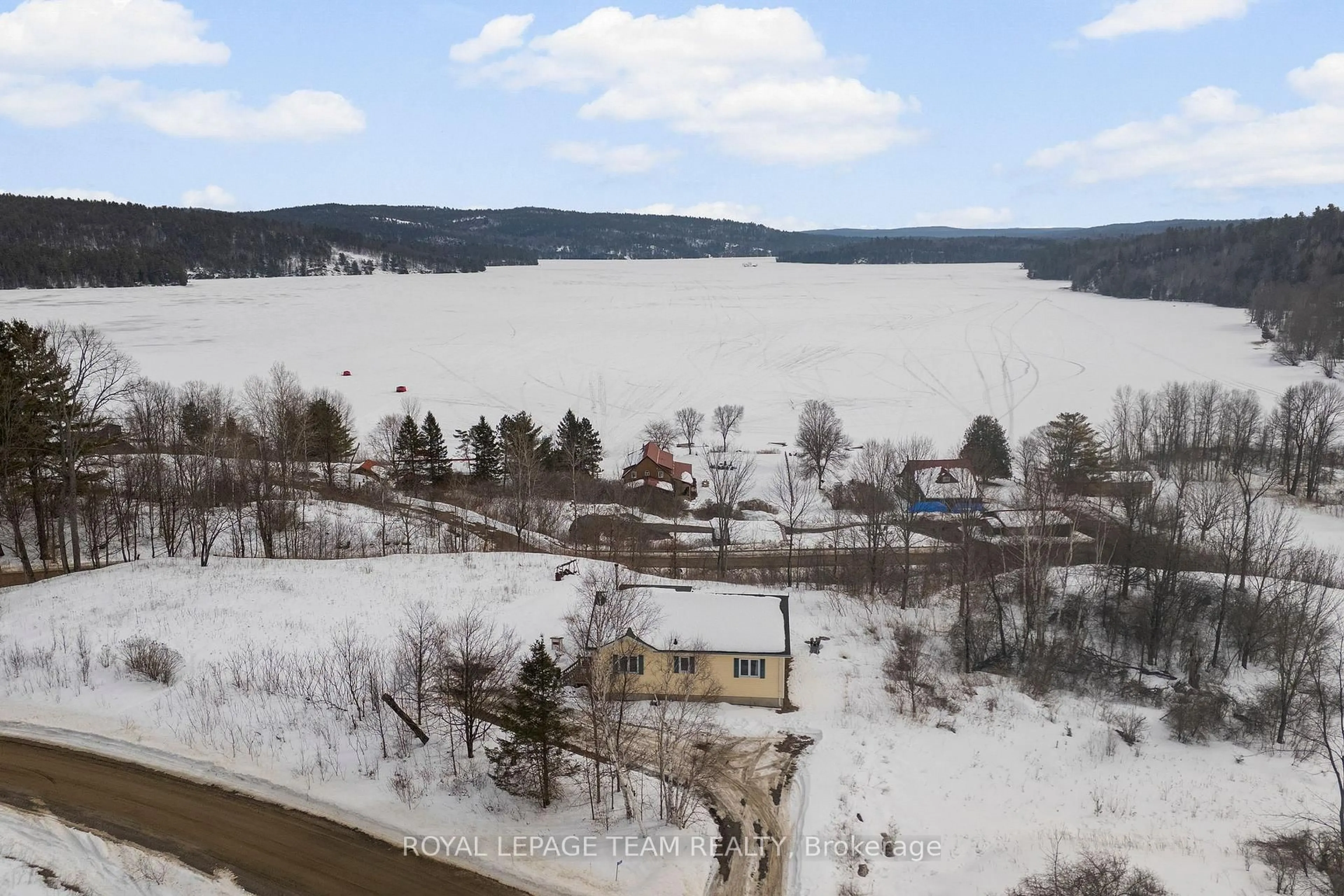 A pic from outside/outdoor area/front of a property/back of a property/a pic from drone, water/lake/river/ocean view for 1086 Victory Lane, Calabogie Ontario K0J 1H0