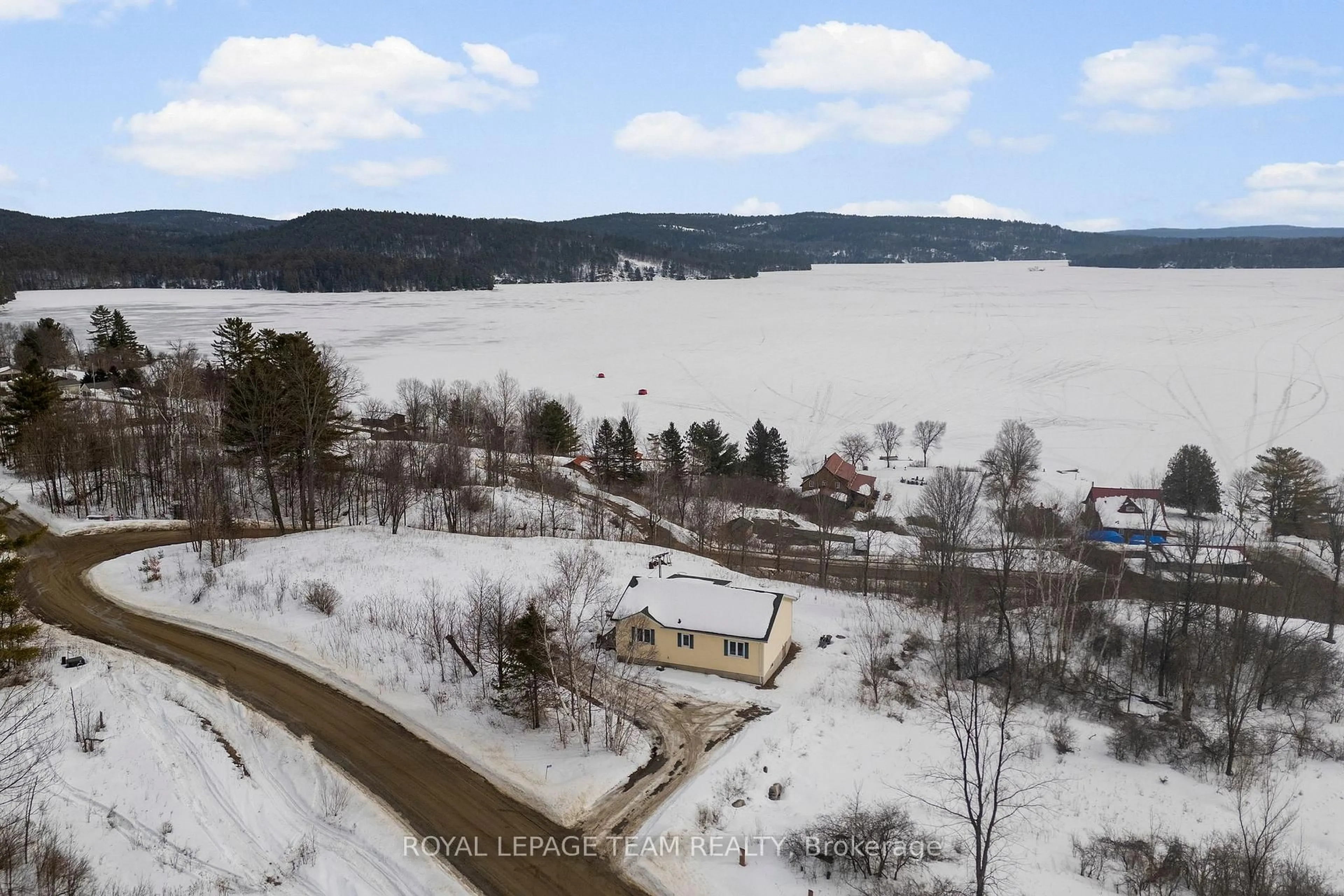A pic from outside/outdoor area/front of a property/back of a property/a pic from drone, water/lake/river/ocean view for 1086 Victory Lane, Calabogie Ontario K0J 1H0