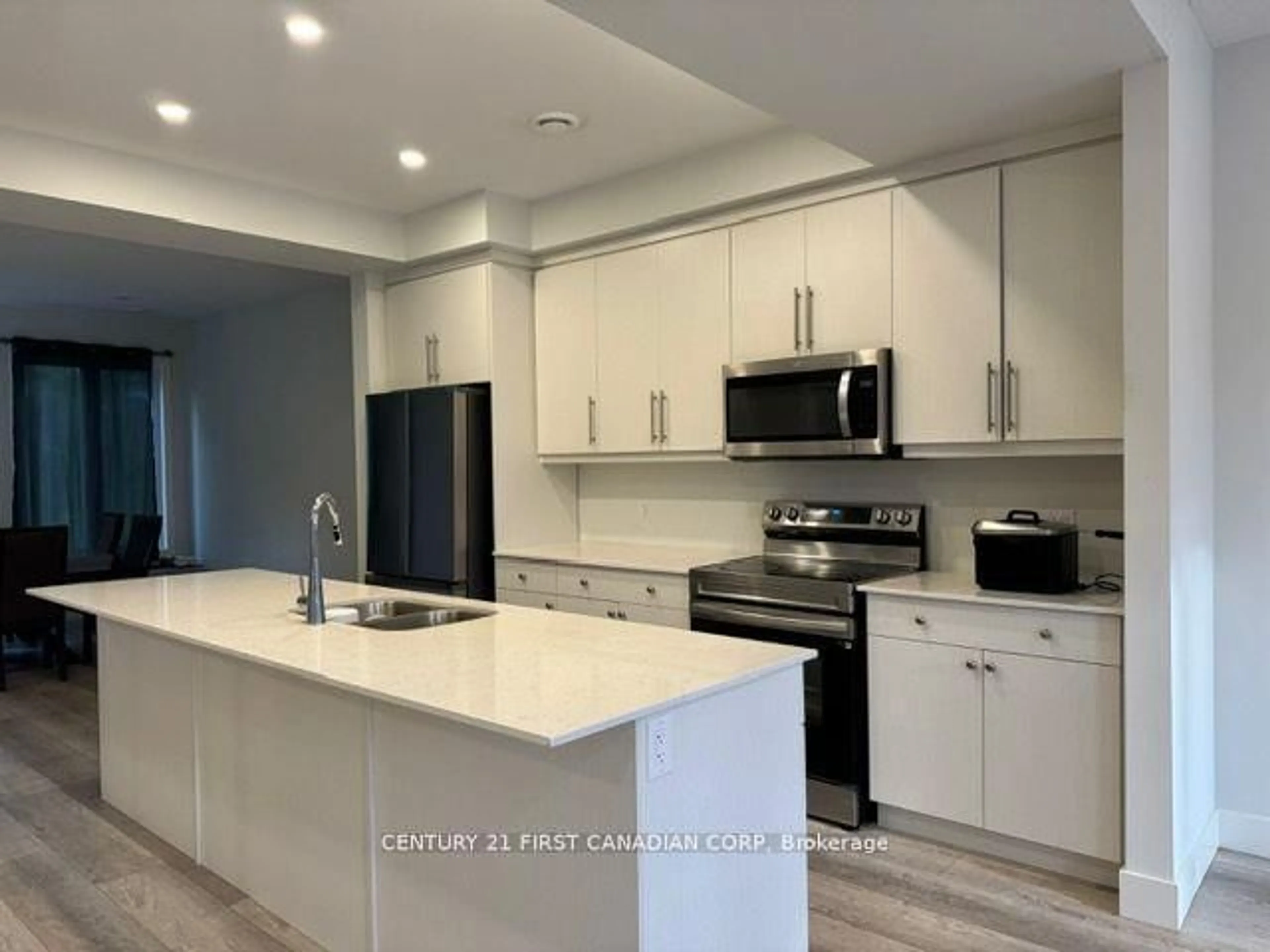 Open concept kitchen, ceramic/tile floor for 990 DEVERON Cres #49, London South Ontario N5Z 0B3