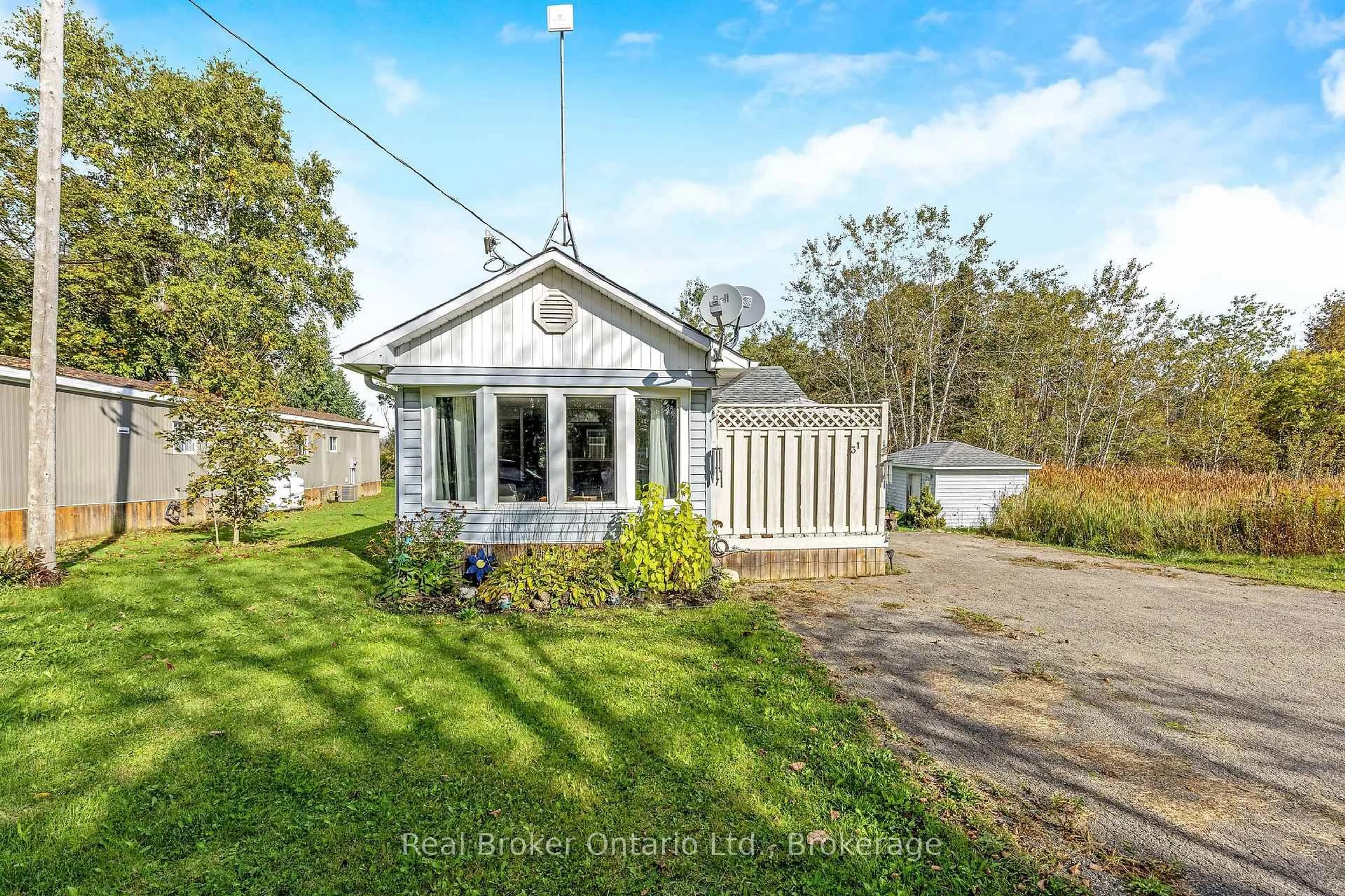 A pic from outside/outdoor area/front of a property/back of a property/a pic from drone, unknown for 026585 89 Highway #31, Southgate Ontario N0C 1B0