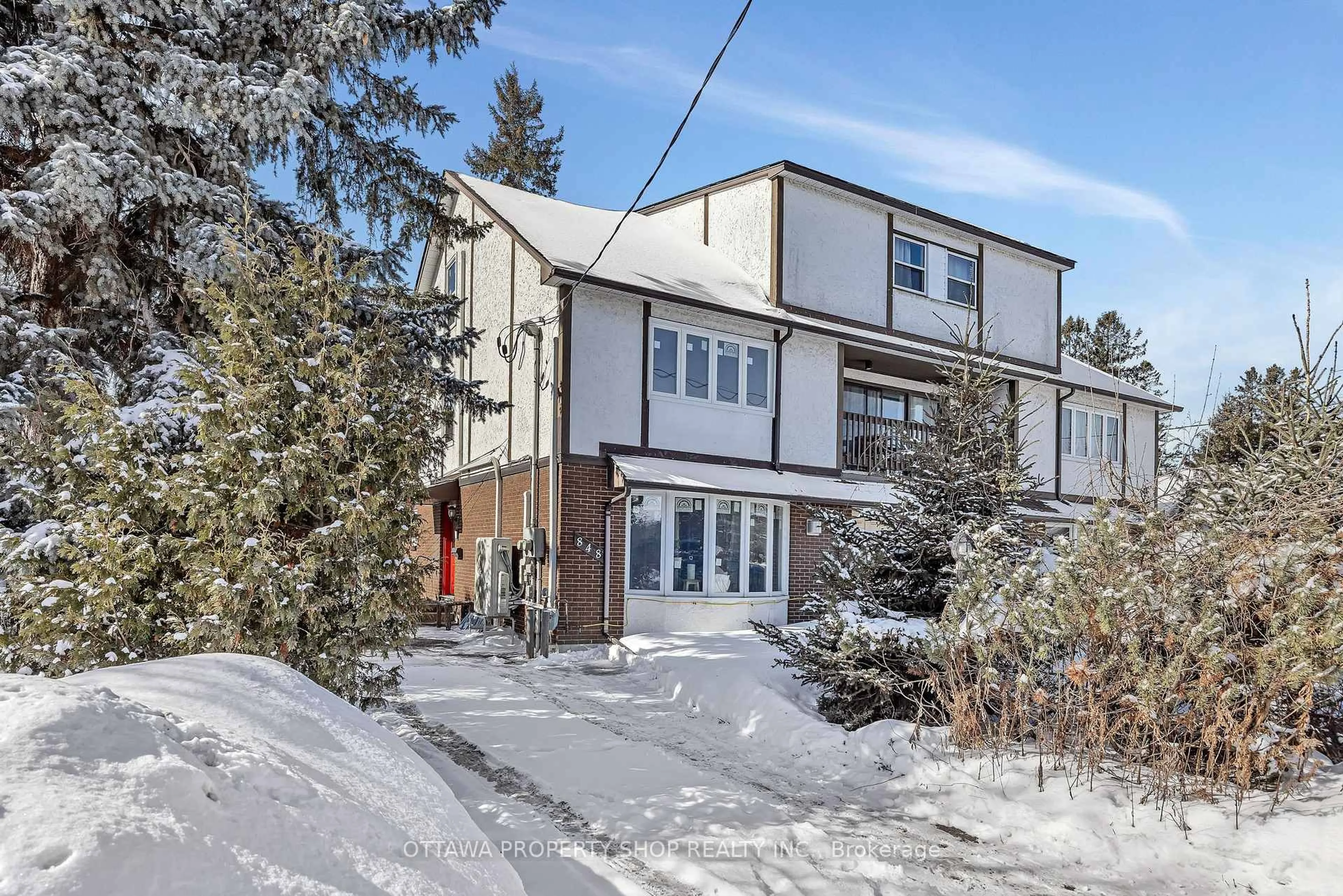 A pic from outside/outdoor area/front of a property/back of a property/a pic from drone, street for 848 Maitland Ave, Ottawa Ontario K2A 2S3