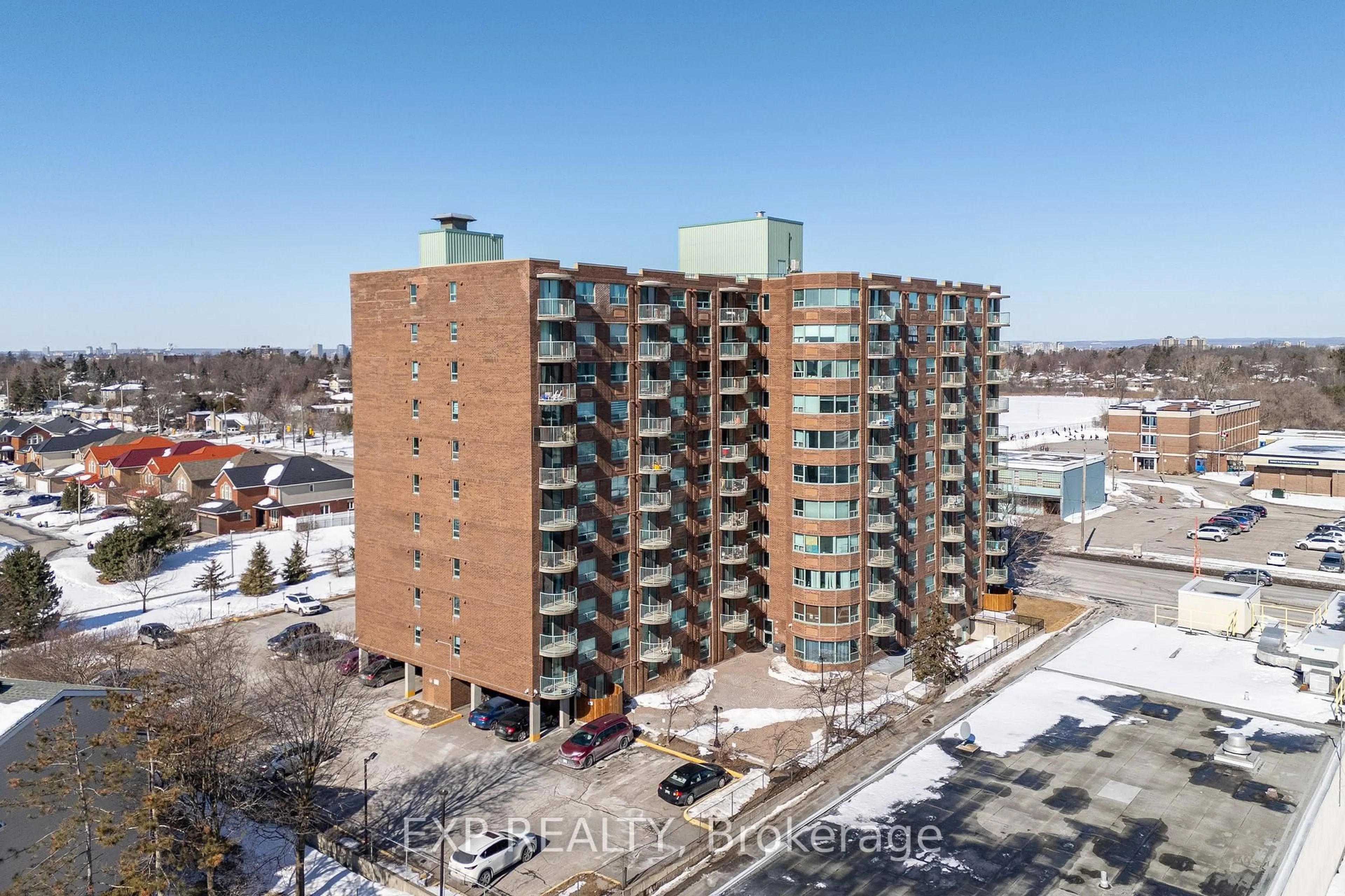 A pic from outside/outdoor area/front of a property/back of a property/a pic from drone, unknown for 1440 Heron Rd #1004, Ottawa Ontario K1V 0X2