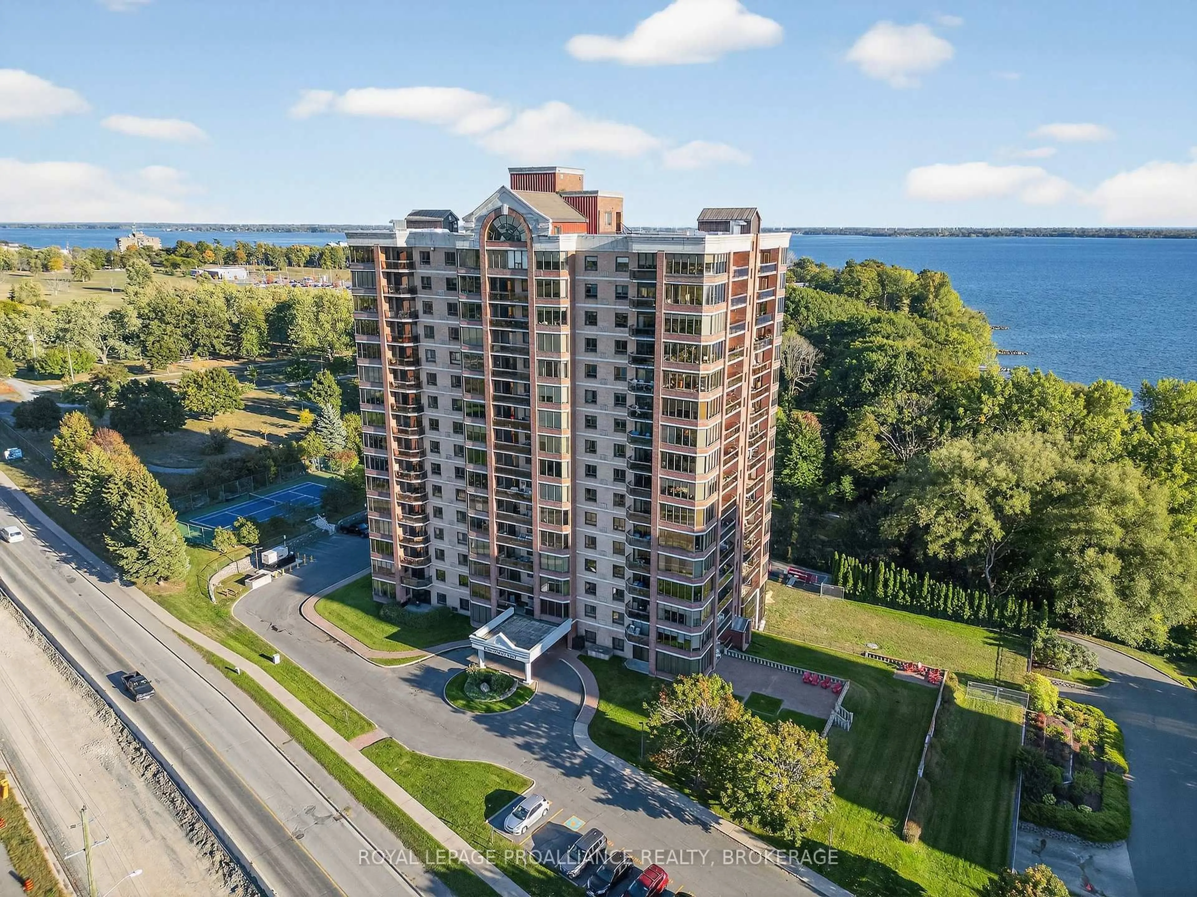 A pic from outside/outdoor area/front of a property/back of a property/a pic from drone, water/lake/river/ocean view for 1000 King St #404, Kingston Ontario K7M 8H3