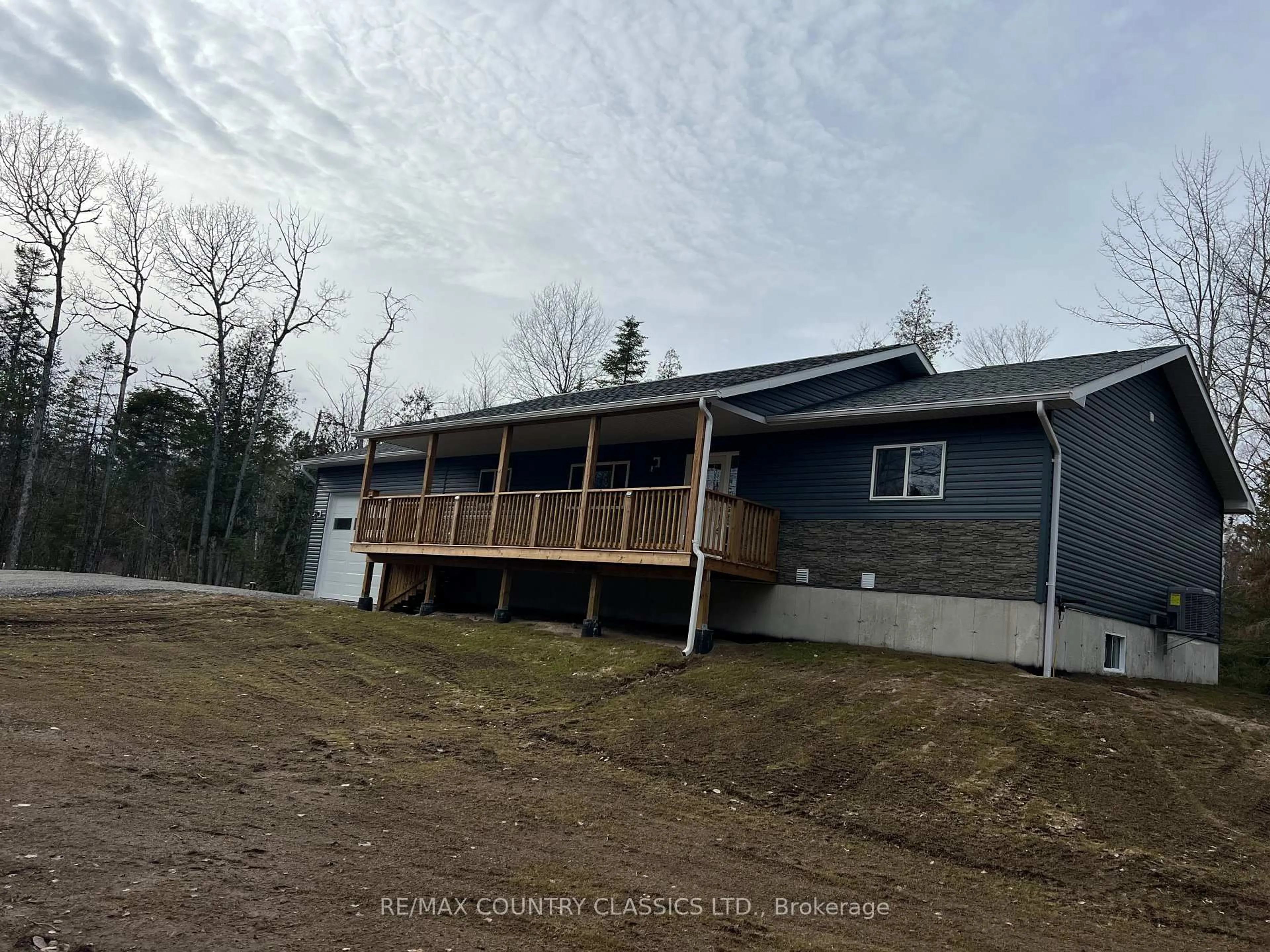 A pic from outside/outdoor area/front of a property/back of a property/a pic from drone, building for 25350A Highway 62, Bancroft Ontario K0L 1C0