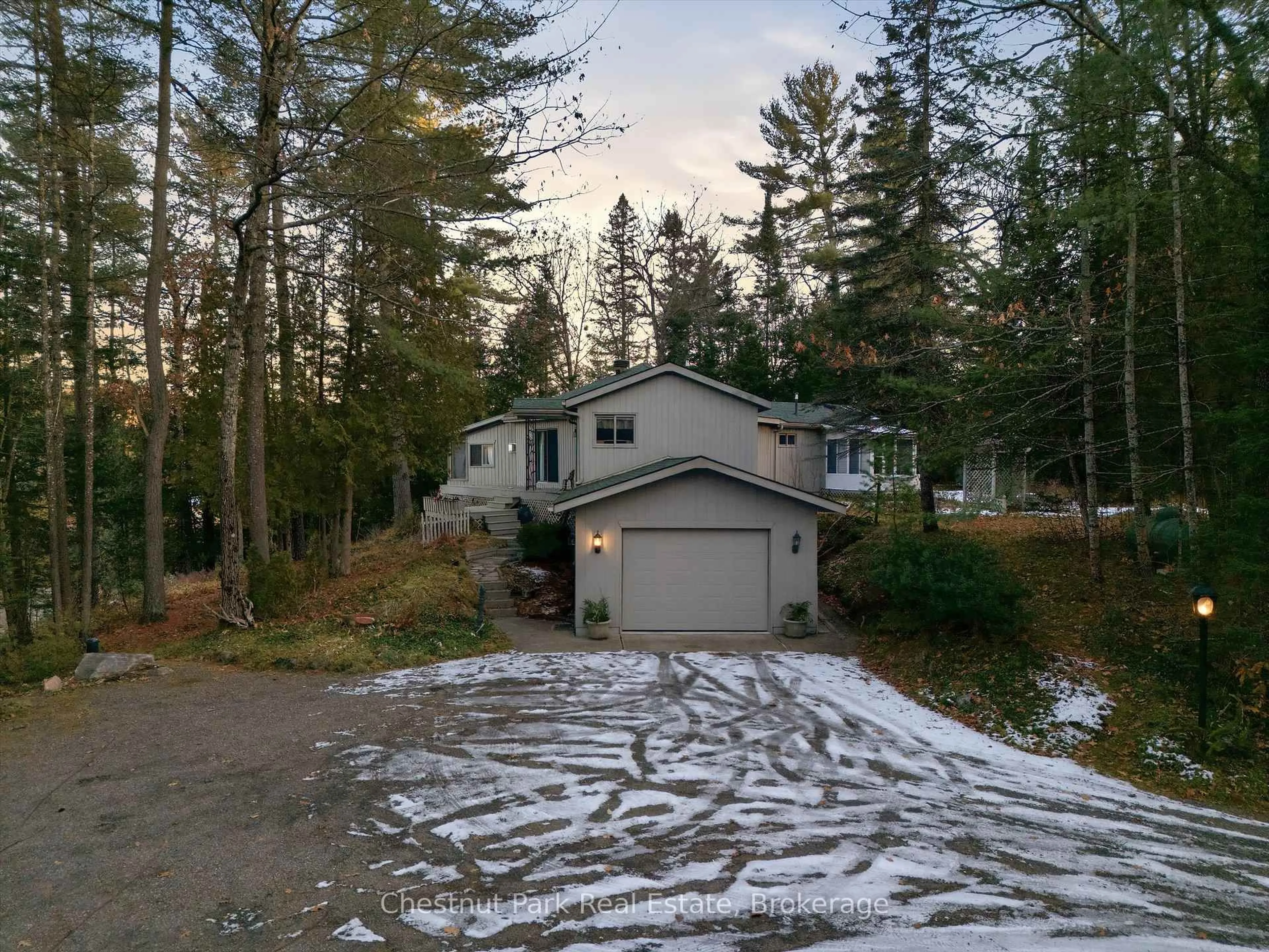 A pic from outside/outdoor area/front of a property/back of a property/a pic from drone, forest/trees view for 1077 Fairy Falls Rd, Lake of Bays Ontario P0B 1A0