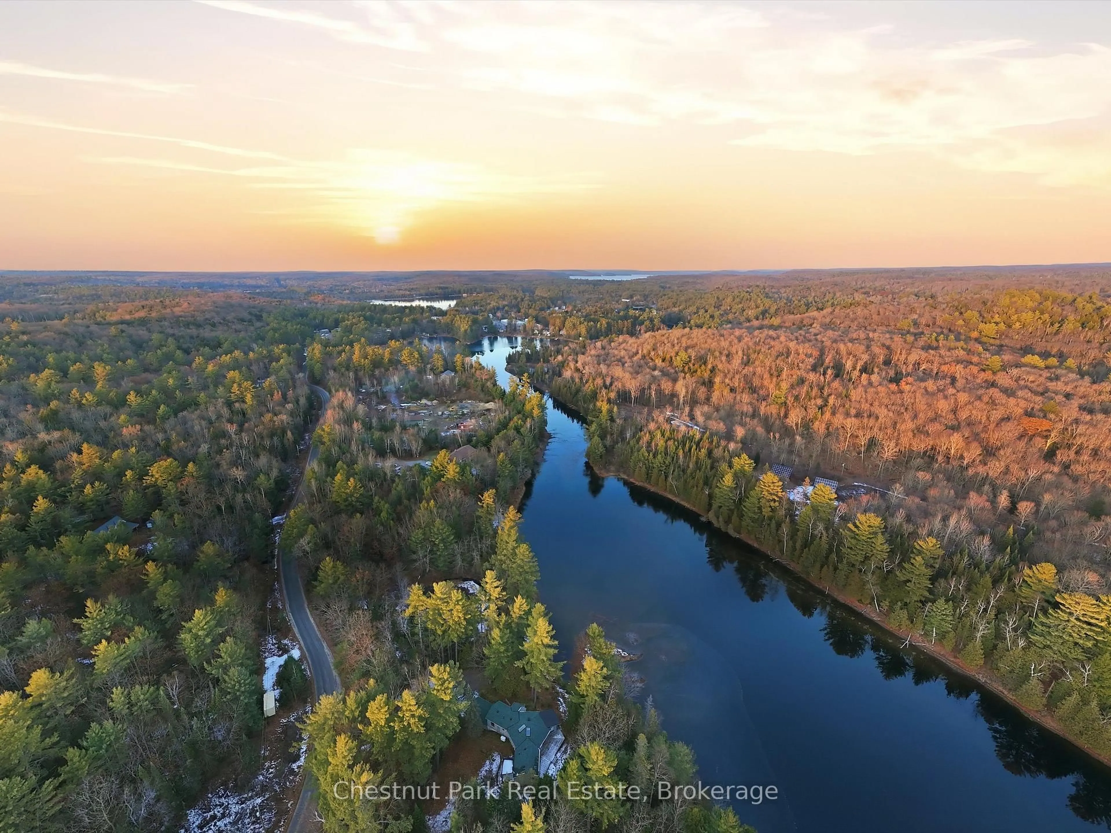 A pic from outside/outdoor area/front of a property/back of a property/a pic from drone, water/lake/river/ocean view for 1077 Fairy Falls Rd, Lake of Bays Ontario P0B 1A0