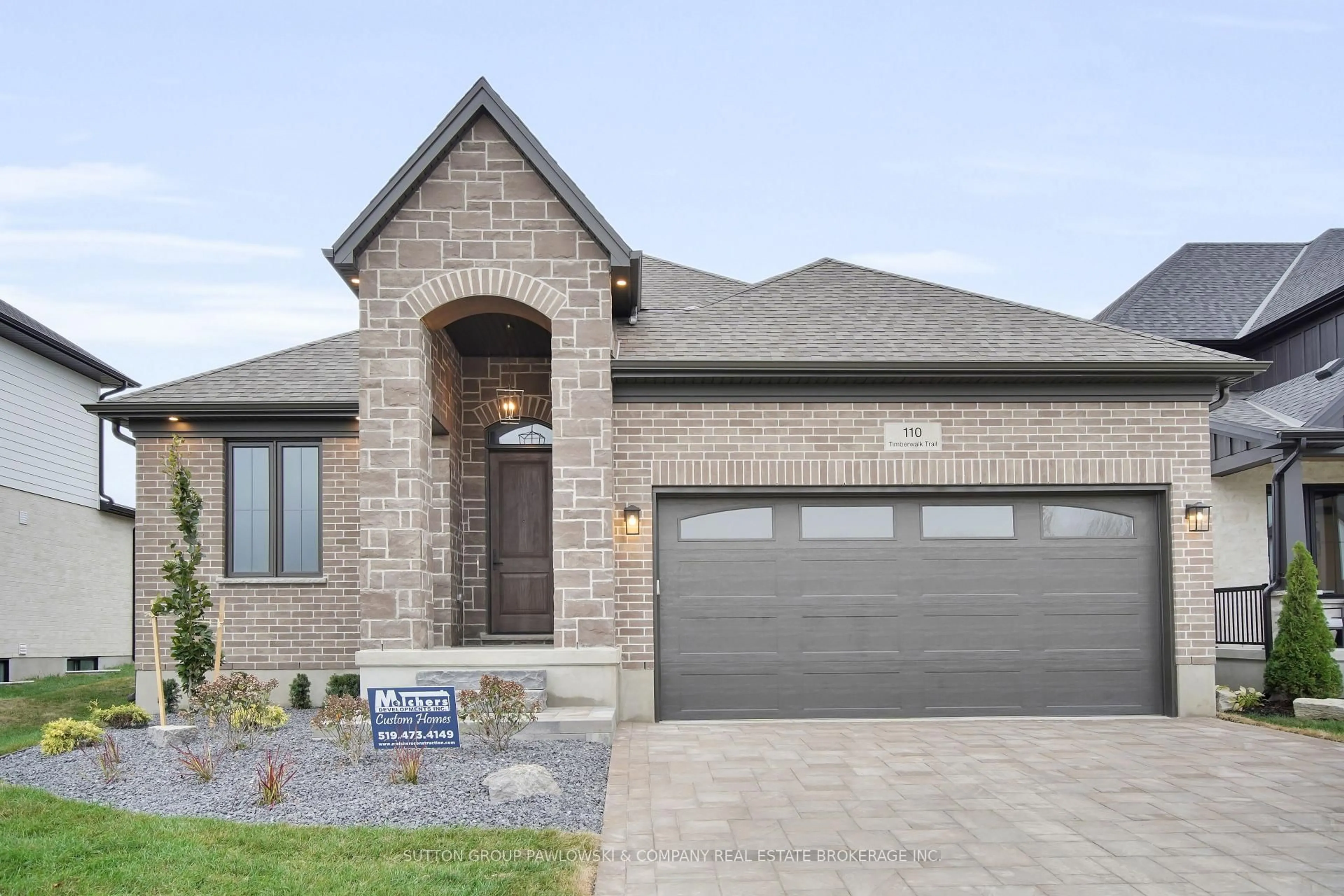 Home with brick exterior material, street for 194 TIMBERWALK Tr #LOT #17, Middlesex Centre Ontario N0M 2A0