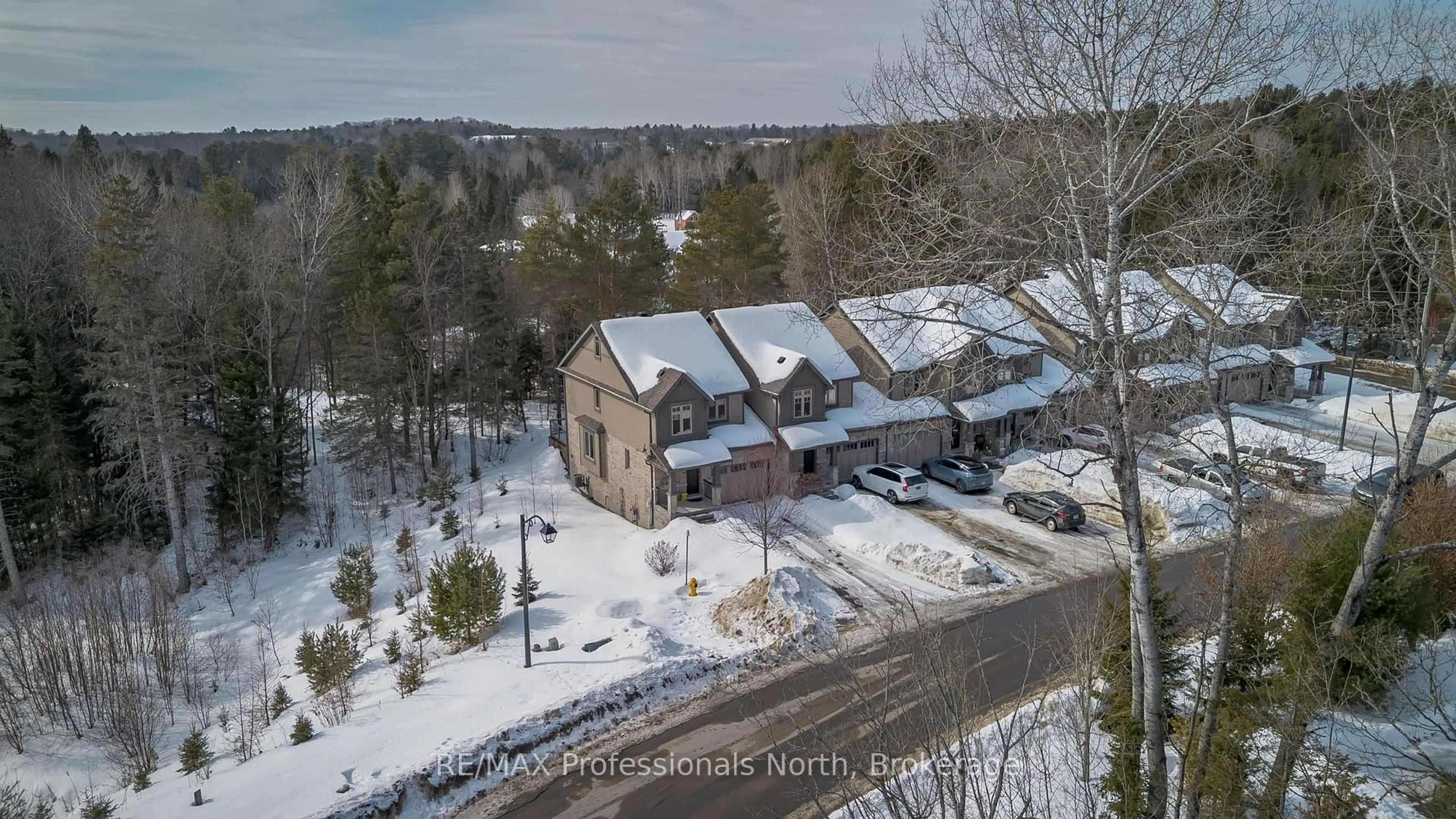 A pic from outside/outdoor area/front of a property/back of a property/a pic from drone, street for 13 Brookside Crossing, Huntsville Ontario P1H 1C9