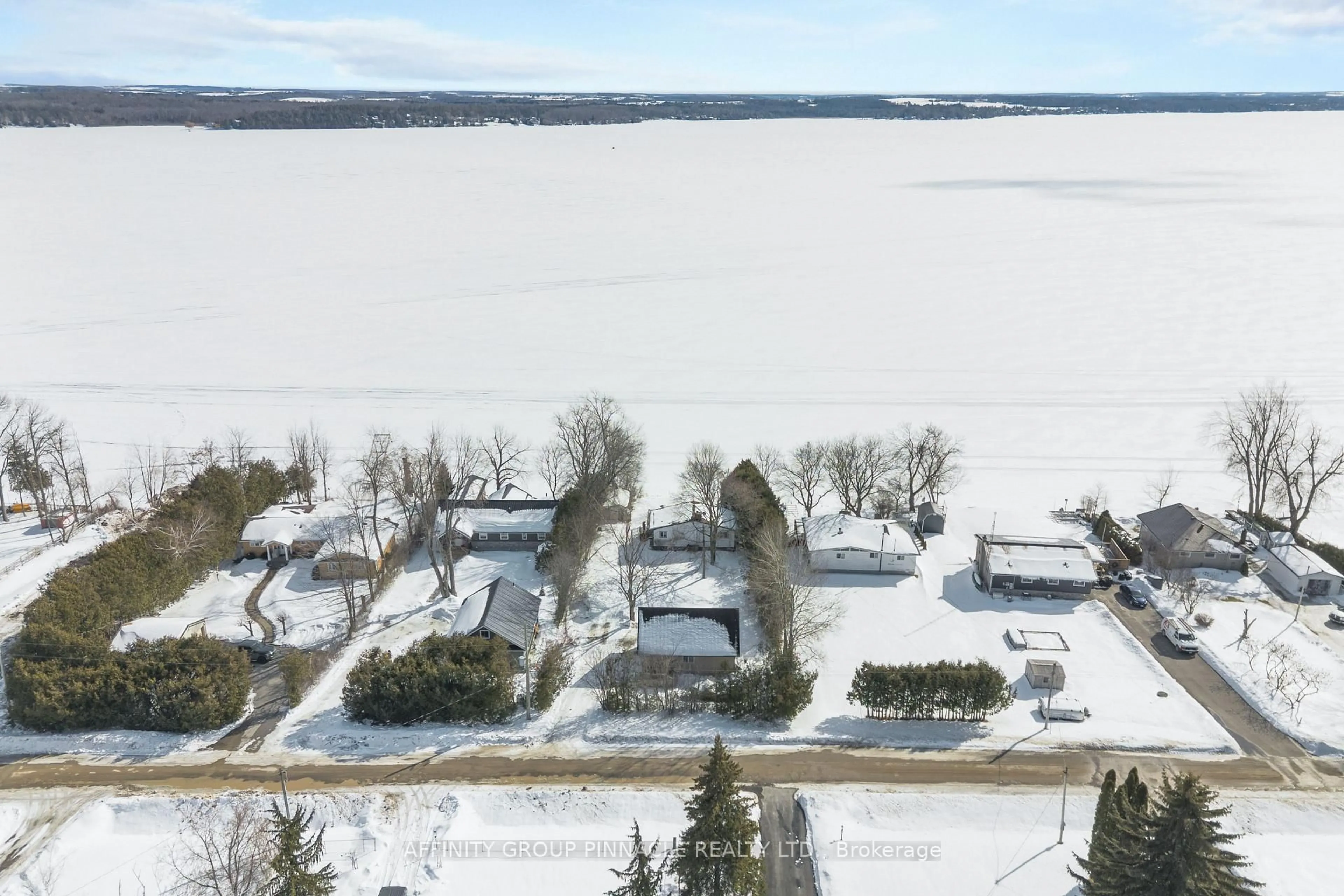 A pic from outside/outdoor area/front of a property/back of a property/a pic from drone, water/lake/river/ocean view for 18 Lakeview Blvd, Kawartha Lakes Ontario K0M 2C0