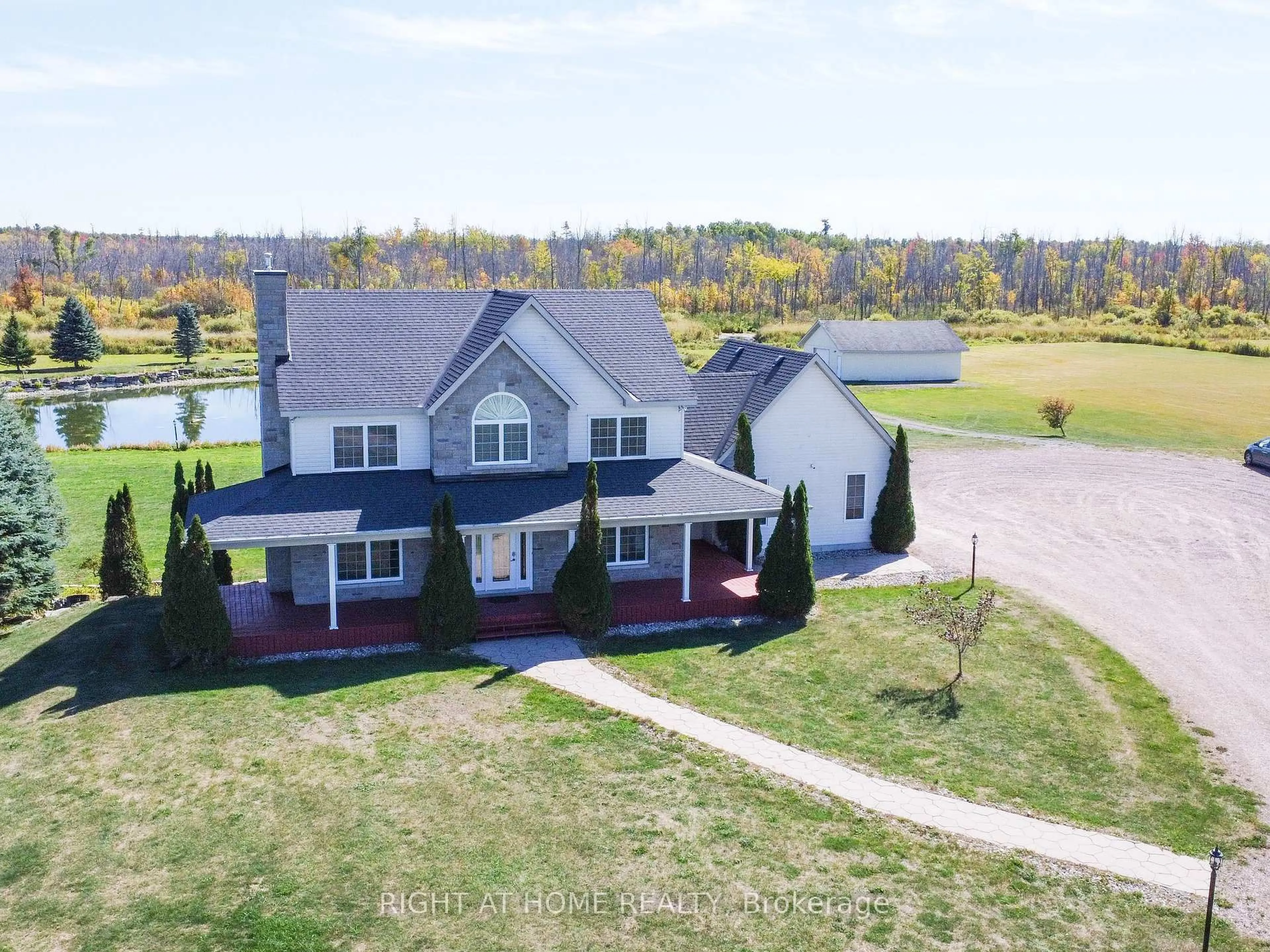 A pic from outside/outdoor area/front of a property/back of a property/a pic from drone, water/lake/river/ocean view for 1165 9TH Line, Carleton Place Ontario K7C 3P2