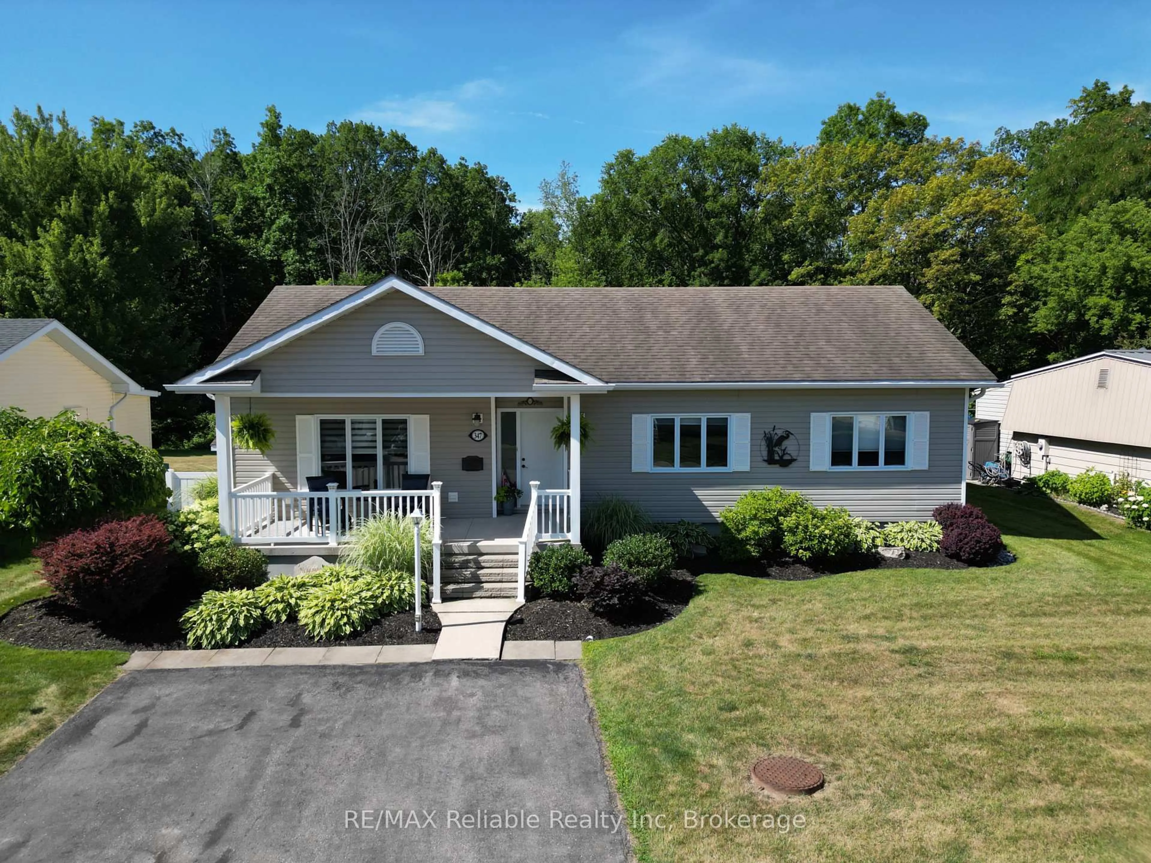 A pic from outside/outdoor area/front of a property/back of a property/a pic from drone, street for 347 Shannon Blvd, South Huron Ontario N0M 1T0