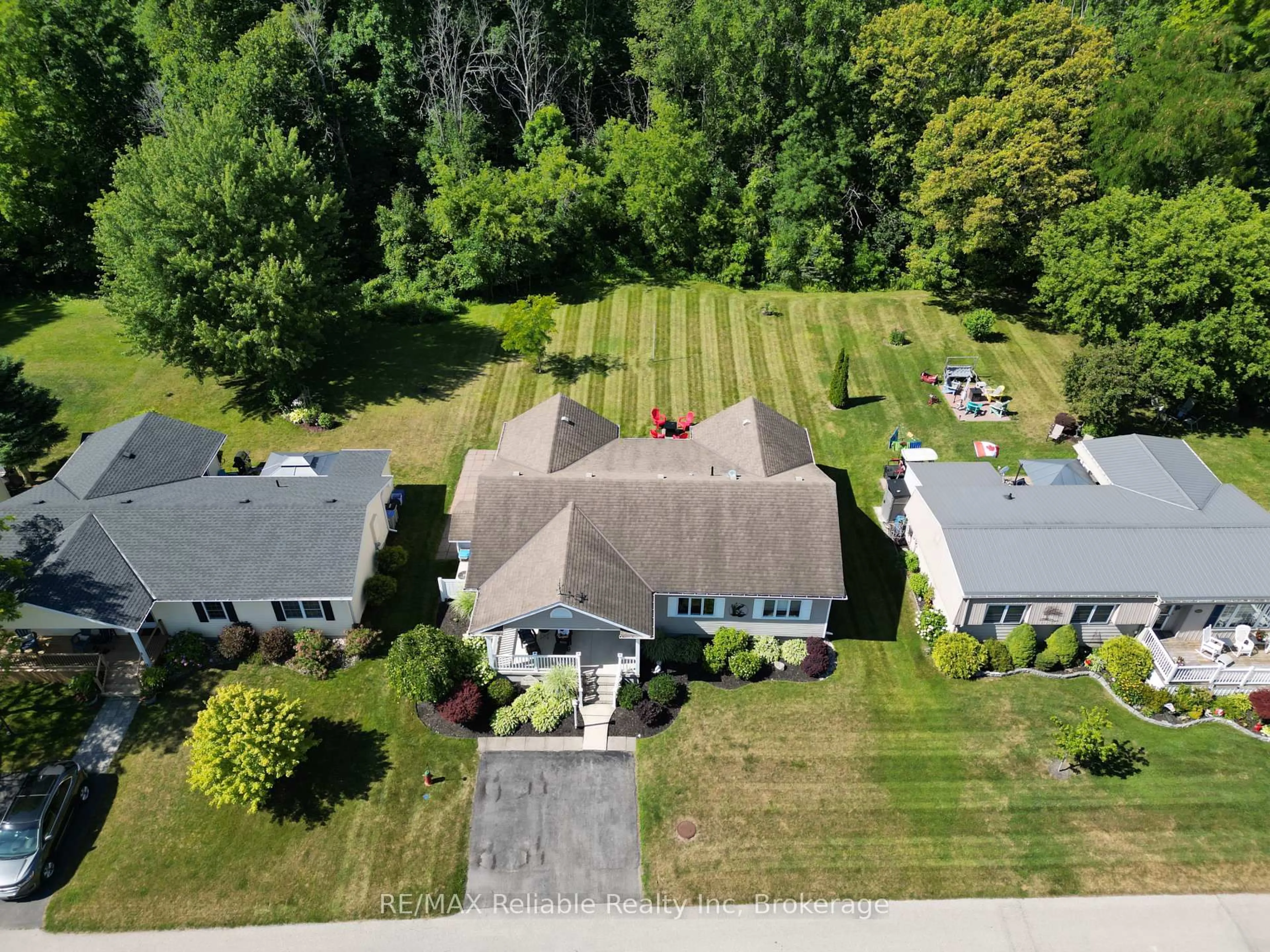 A pic from outside/outdoor area/front of a property/back of a property/a pic from drone, street for 347 Shannon Blvd, South Huron Ontario N0M 1T0