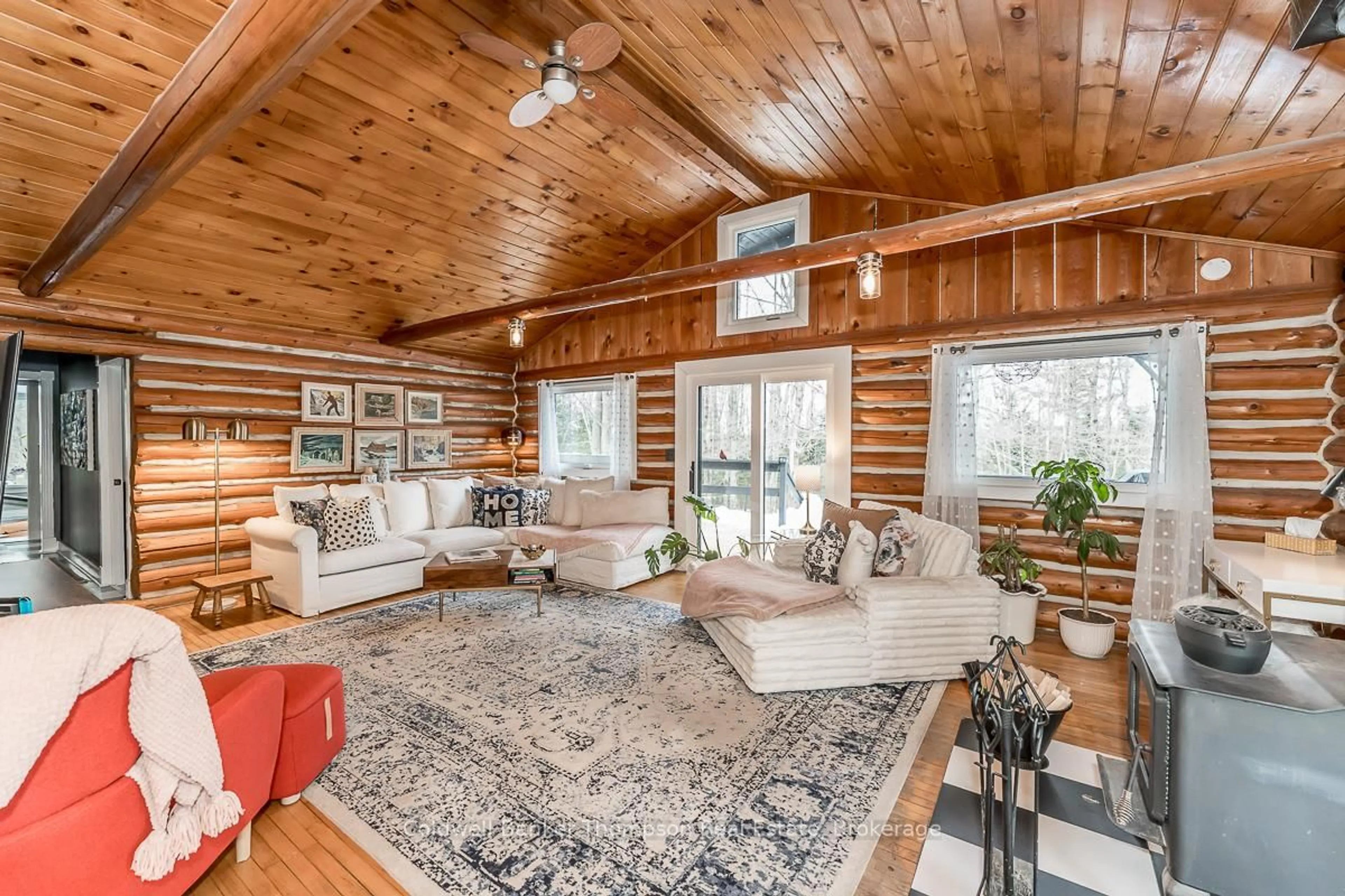 Living room with furniture, wood/laminate floor for 1017 SAVAGE SETTLEMENT Rd, Perry Ontario P0A 1Y0