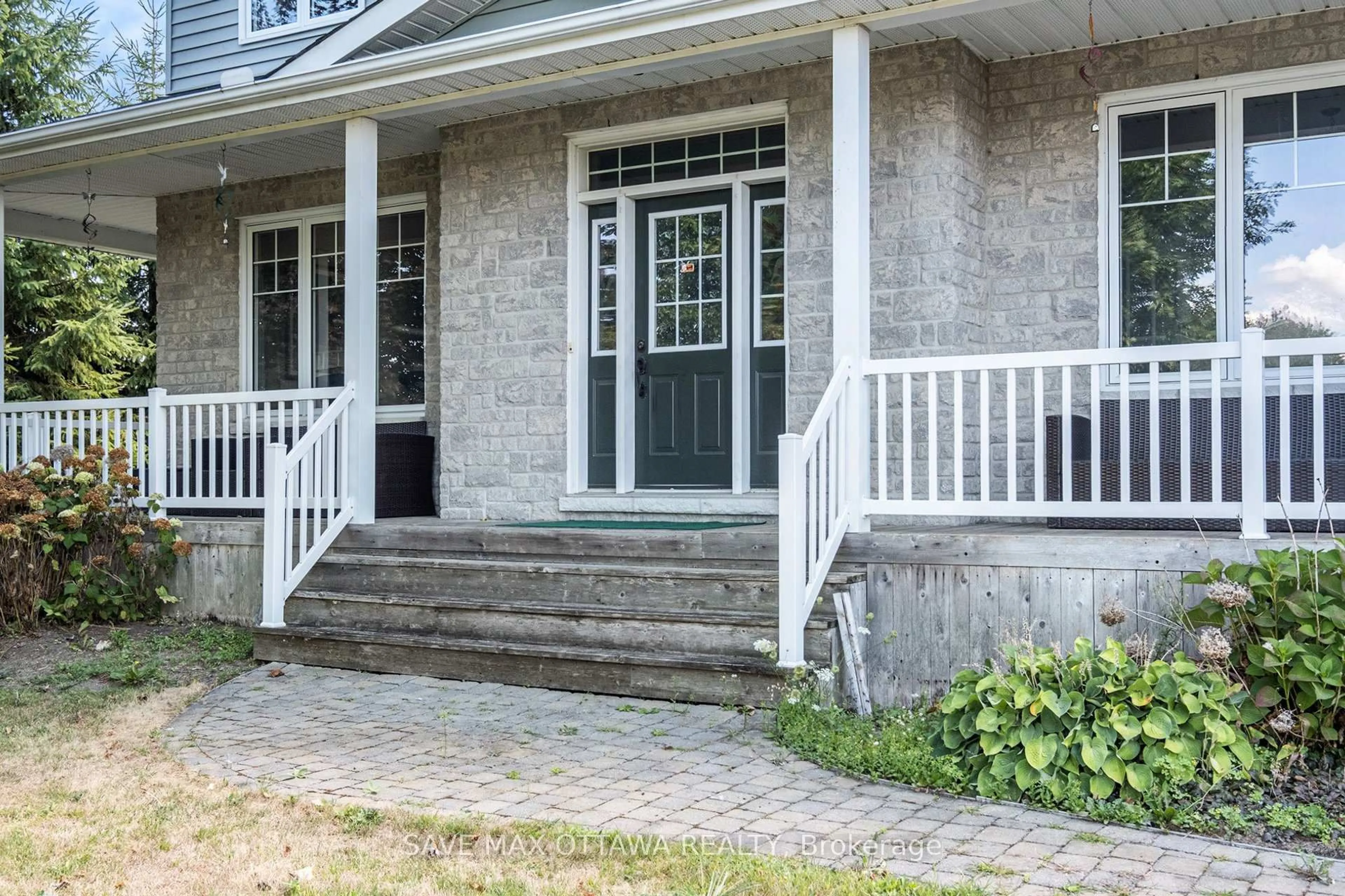 Home with brick exterior material, street for 8050 Craig Farm Dr, Metcalfe Ontario K0A 2P0