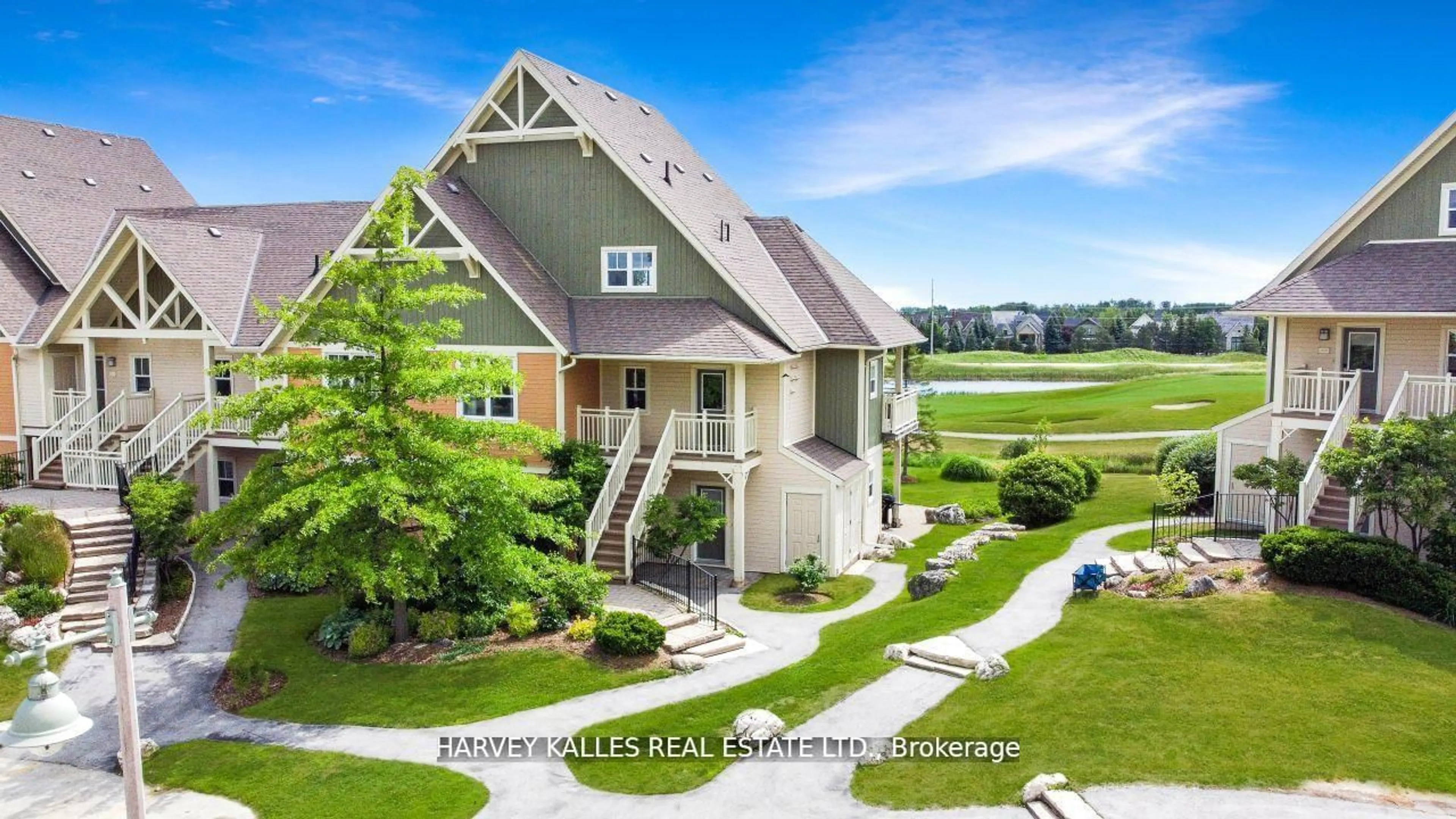 A pic from outside/outdoor area/front of a property/back of a property/a pic from drone, water/lake/river/ocean view for 115 Fairway Crt #211, Blue Mountains Ontario L9Y 0P8