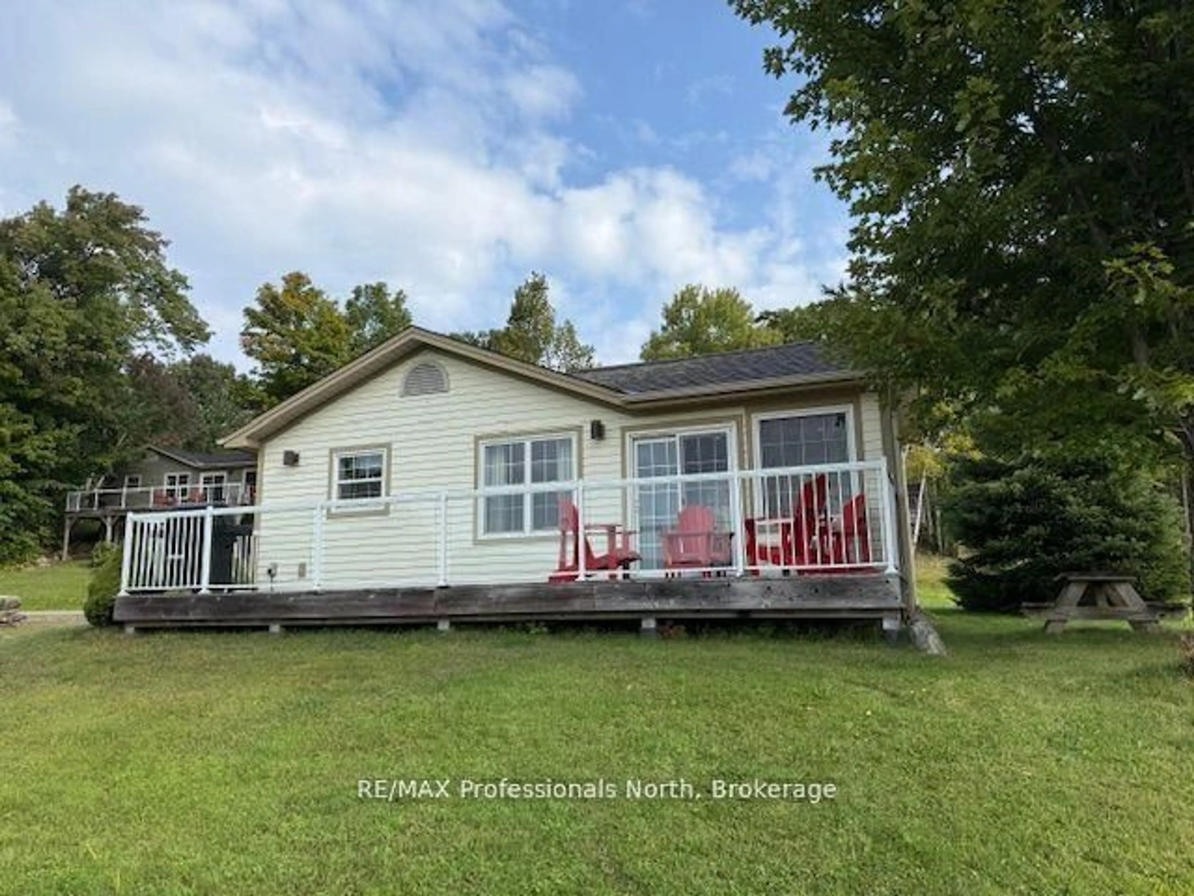 A pic from outside/outdoor area/front of a property/back of a property/a pic from drone, water/lake/river/ocean view for 1052 Rat Bay Rd #126-5, Lake of Bays Ontario P0A 1H0