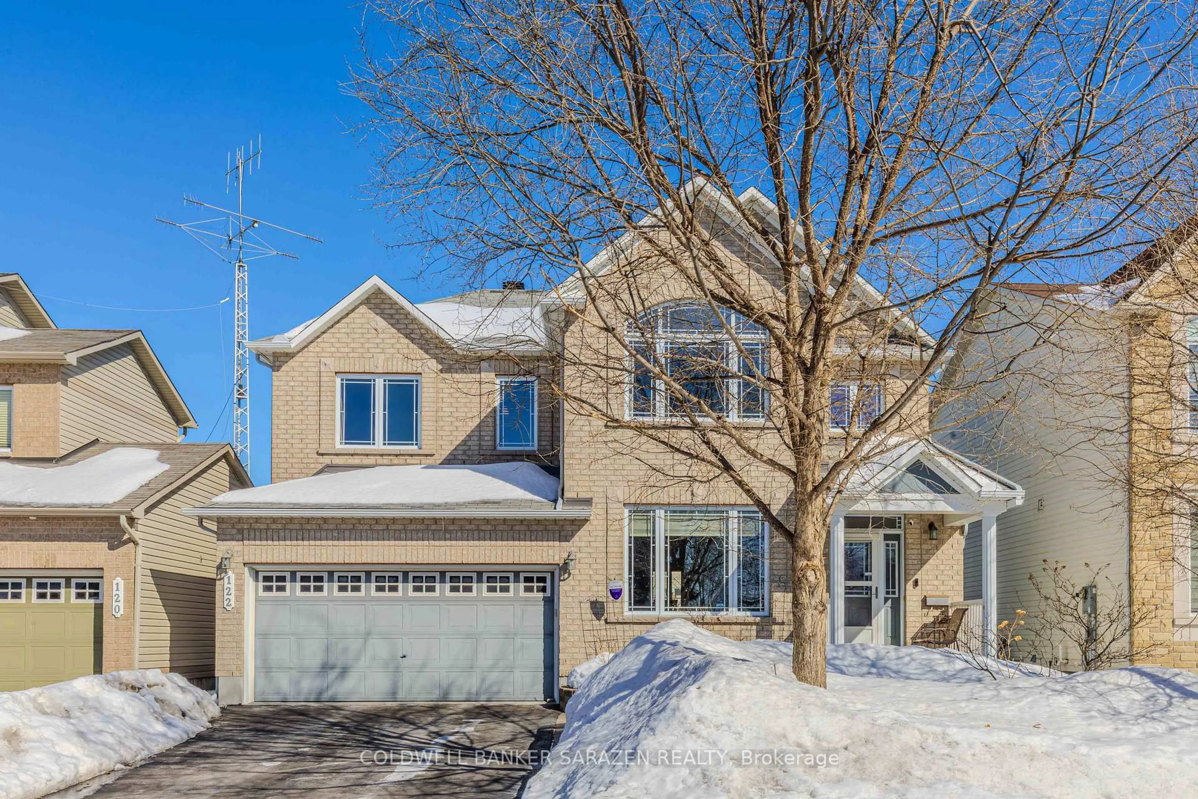 Home with brick exterior material, street for 122 Springton Cres, Barrhaven Ontario K2J 0V9