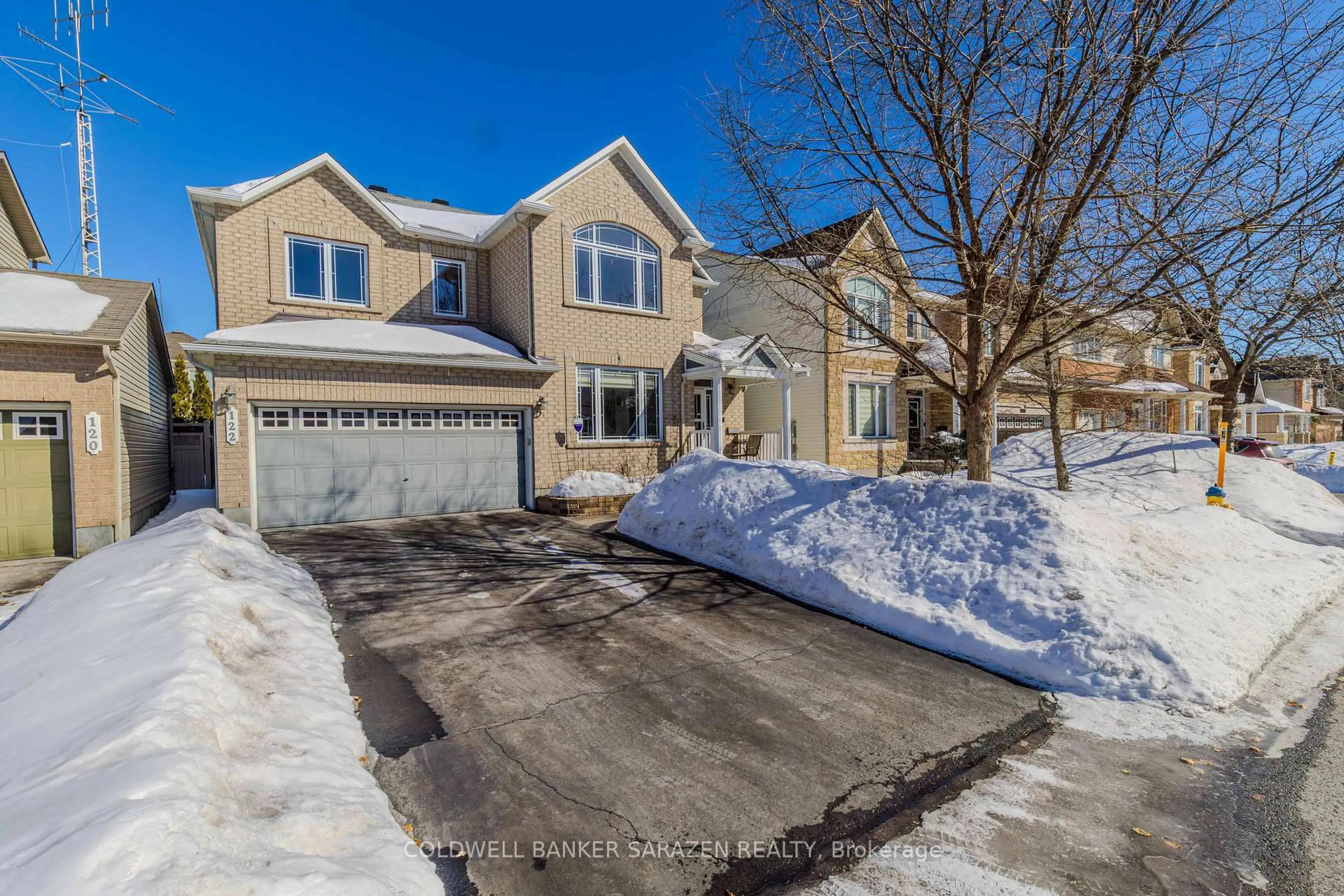 A pic from outside/outdoor area/front of a property/back of a property/a pic from drone, street for 122 Springton Cres, Barrhaven Ontario K2J 0V9