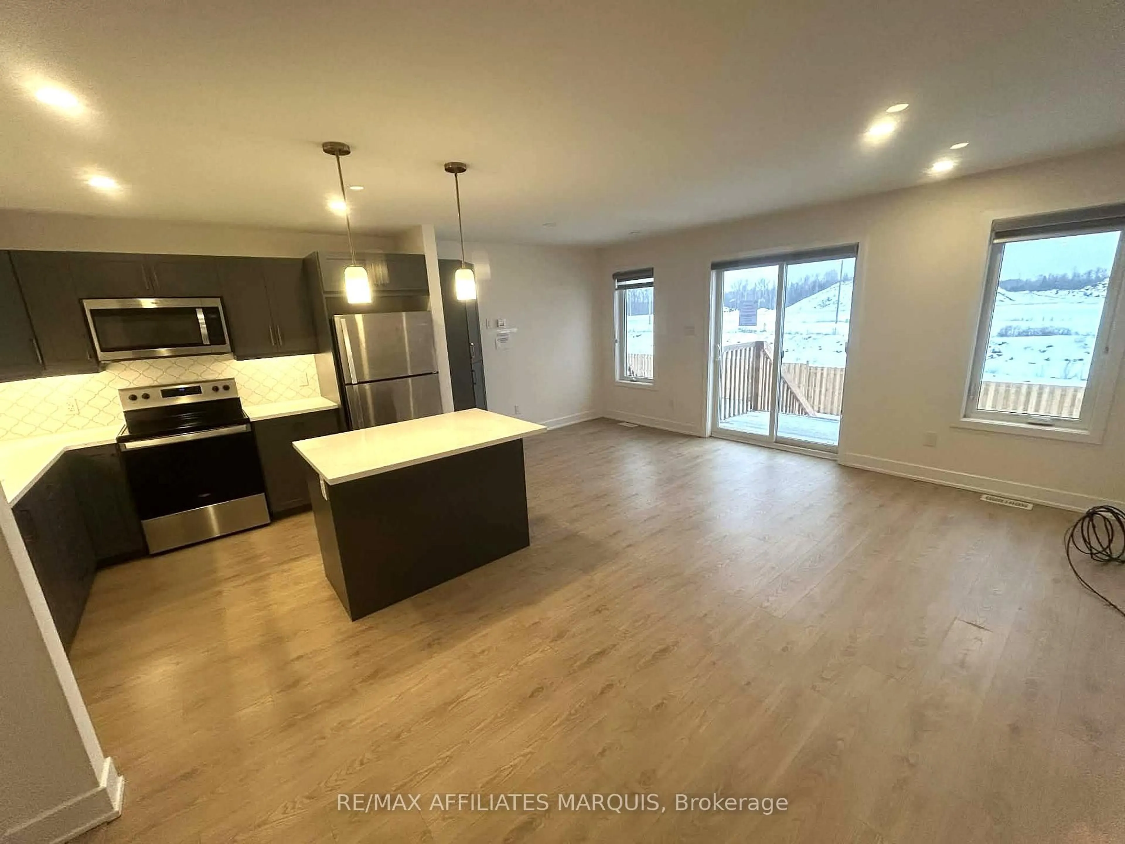 Open concept kitchen, wood/laminate floor for 62 Staples Blvd, Smiths Falls Ontario K7A 0A5