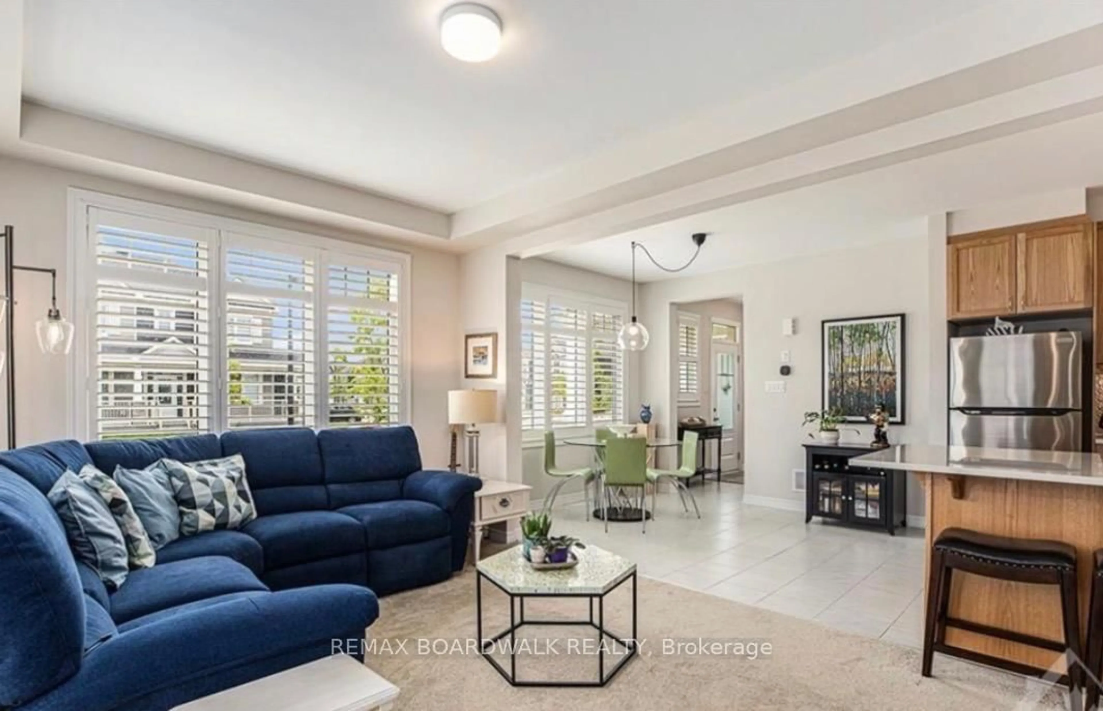 Living room with furniture, ceramic/tile floor for 741 DERREEN Ave, Ottawa Ontario K2S 2Y9