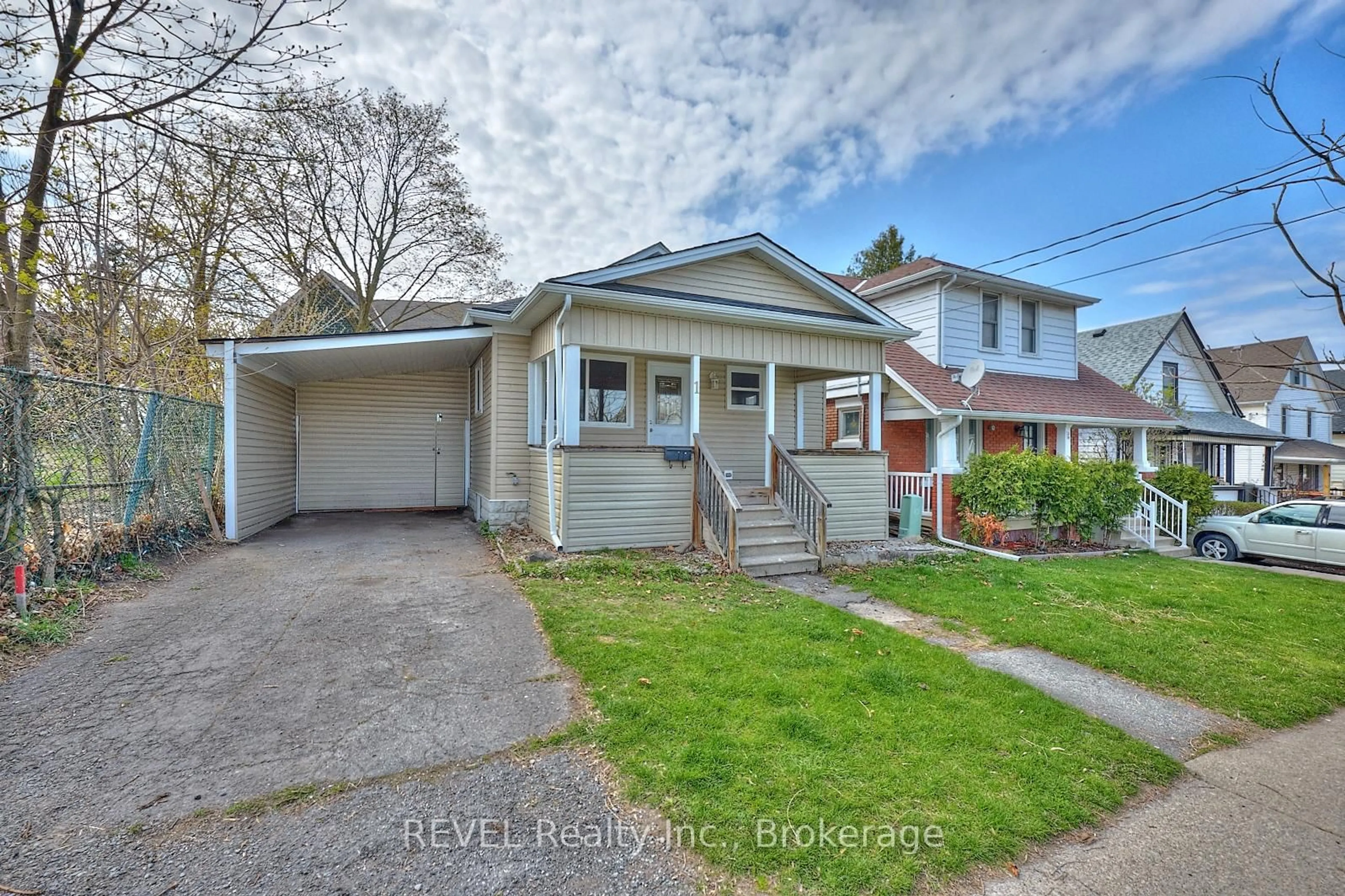 Home with brick exterior material, street for 1 Berryman Ave, St. Catharines Ontario L2R 3W8