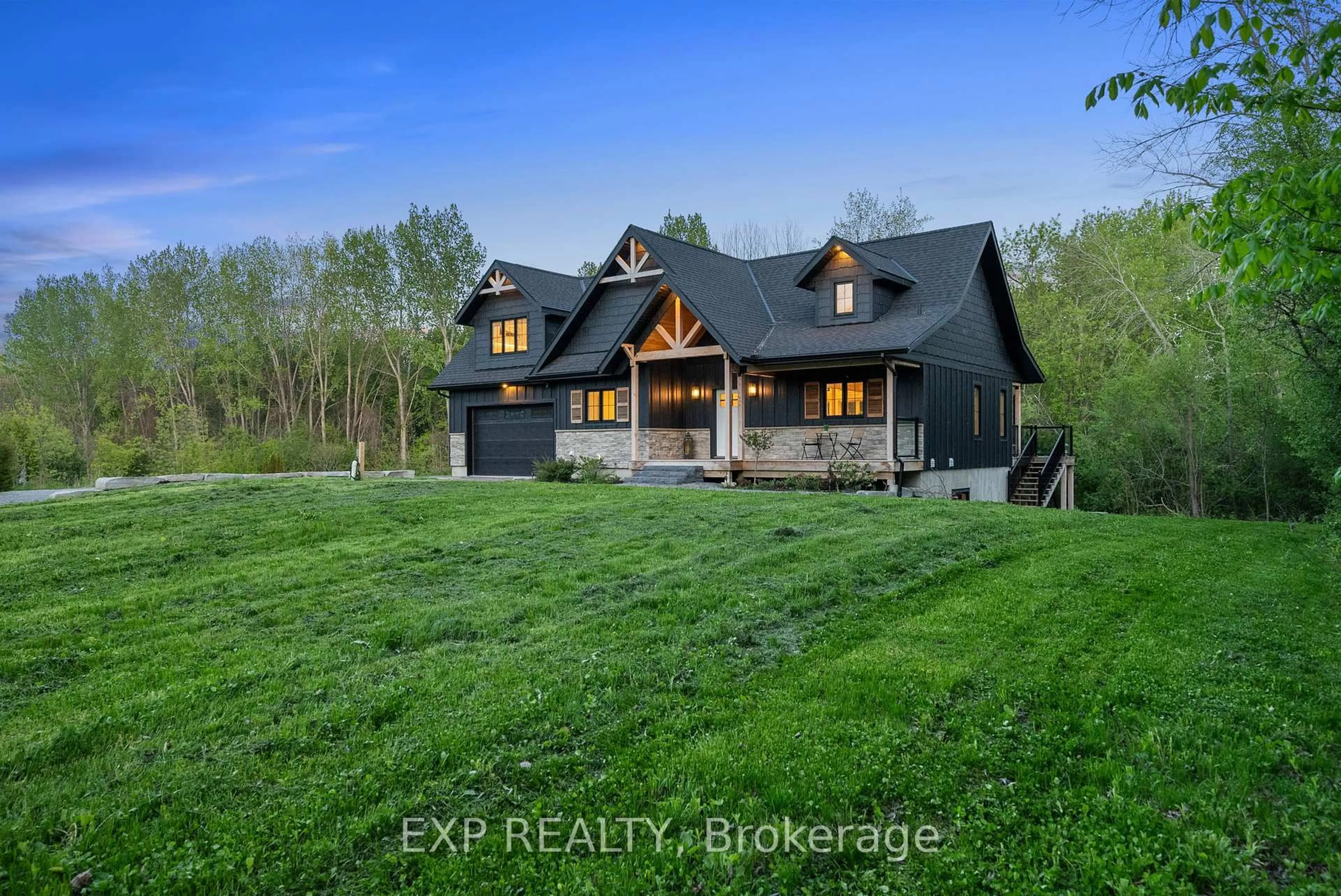A pic from outside/outdoor area/front of a property/back of a property/a pic from drone, water/lake/river/ocean view for 1499 Lakeside Dr, Prince Edward County Ontario K0K 1T0