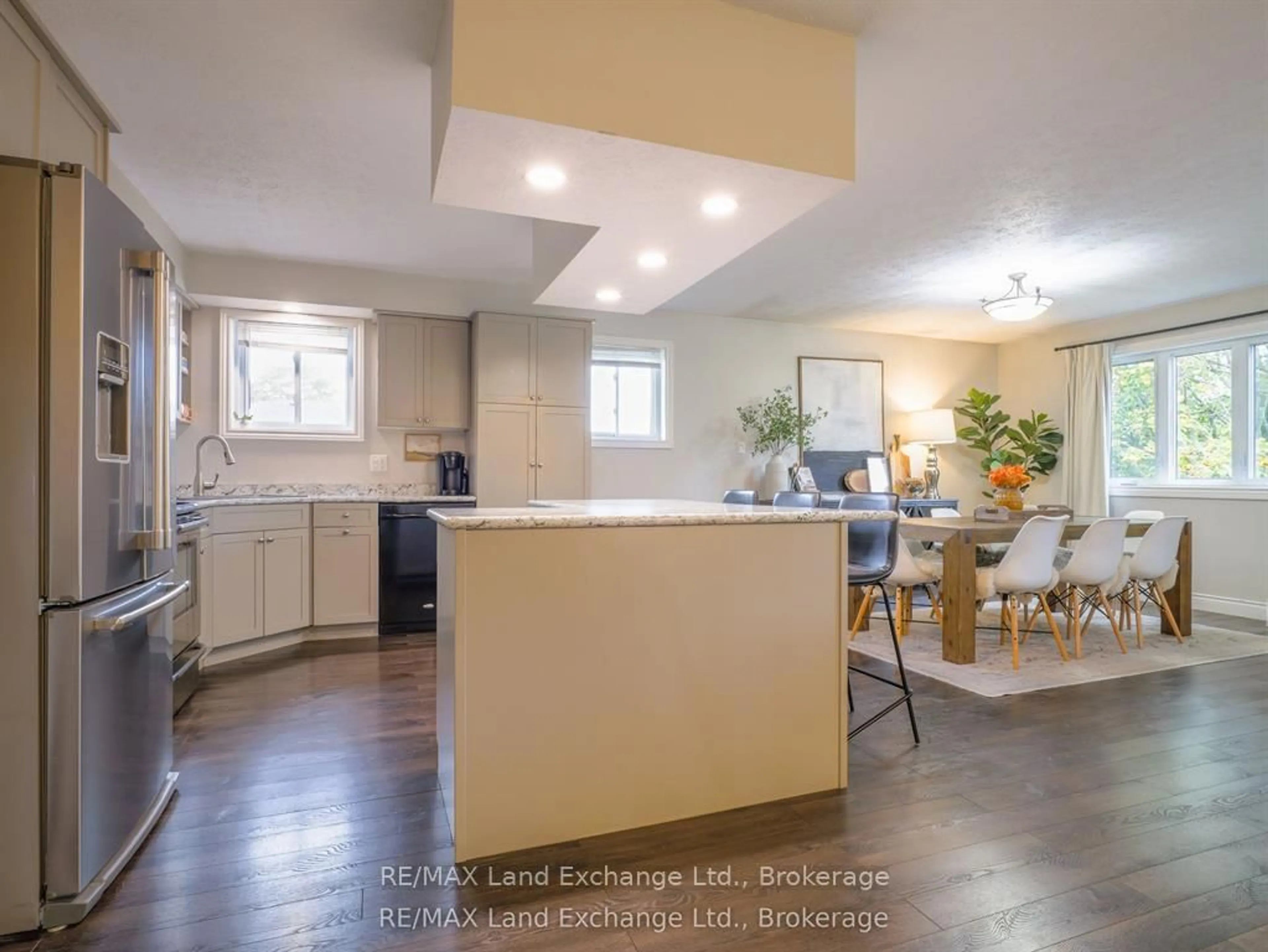 Open concept kitchen, wood/laminate floor for 829 Highland St, Saugeen Shores Ontario N0H 2C2