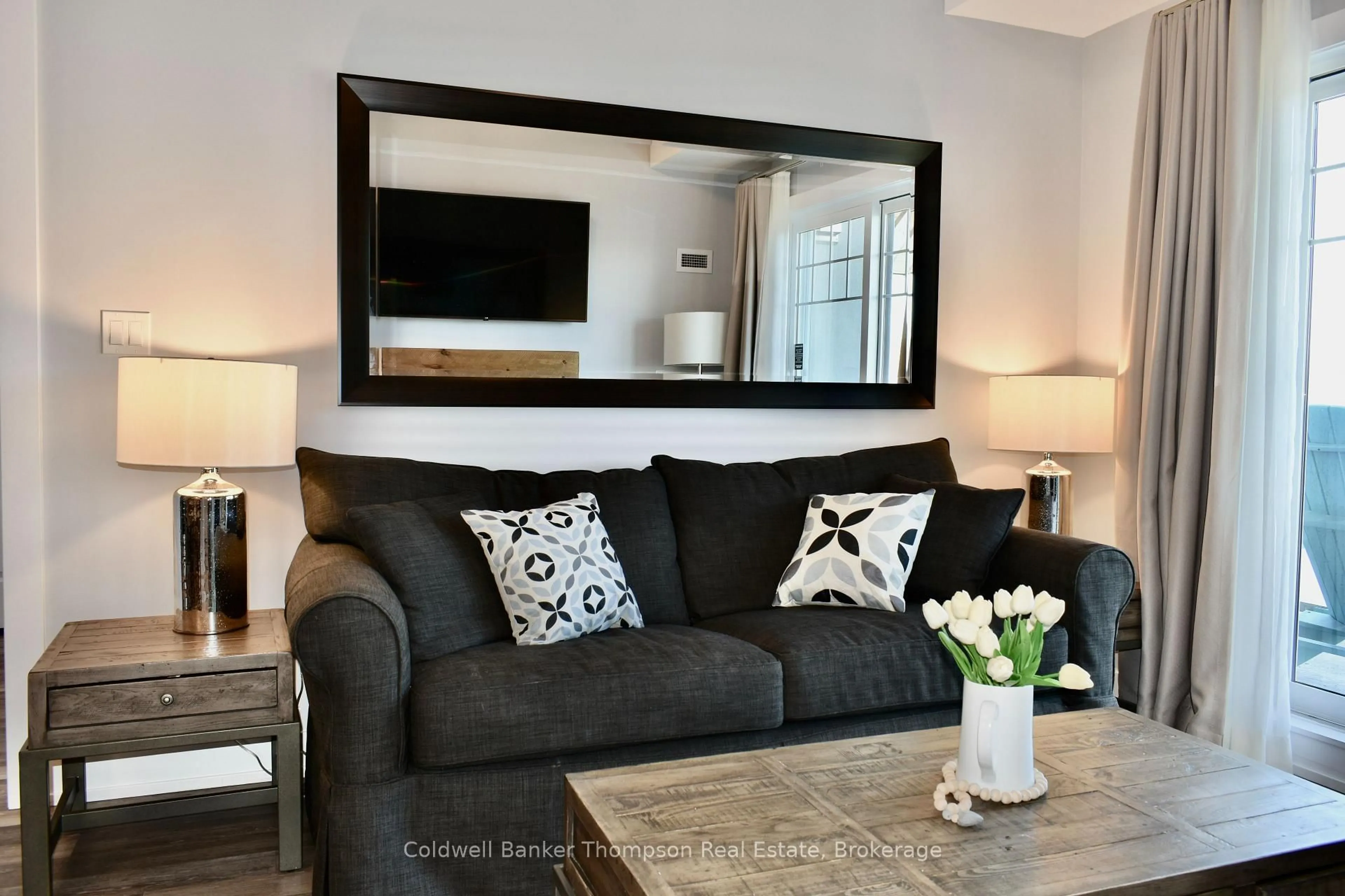 Living room with furniture, unknown for 25 PEN LAKE POINT Rd #404, Huntsville Ontario P1H 1A9